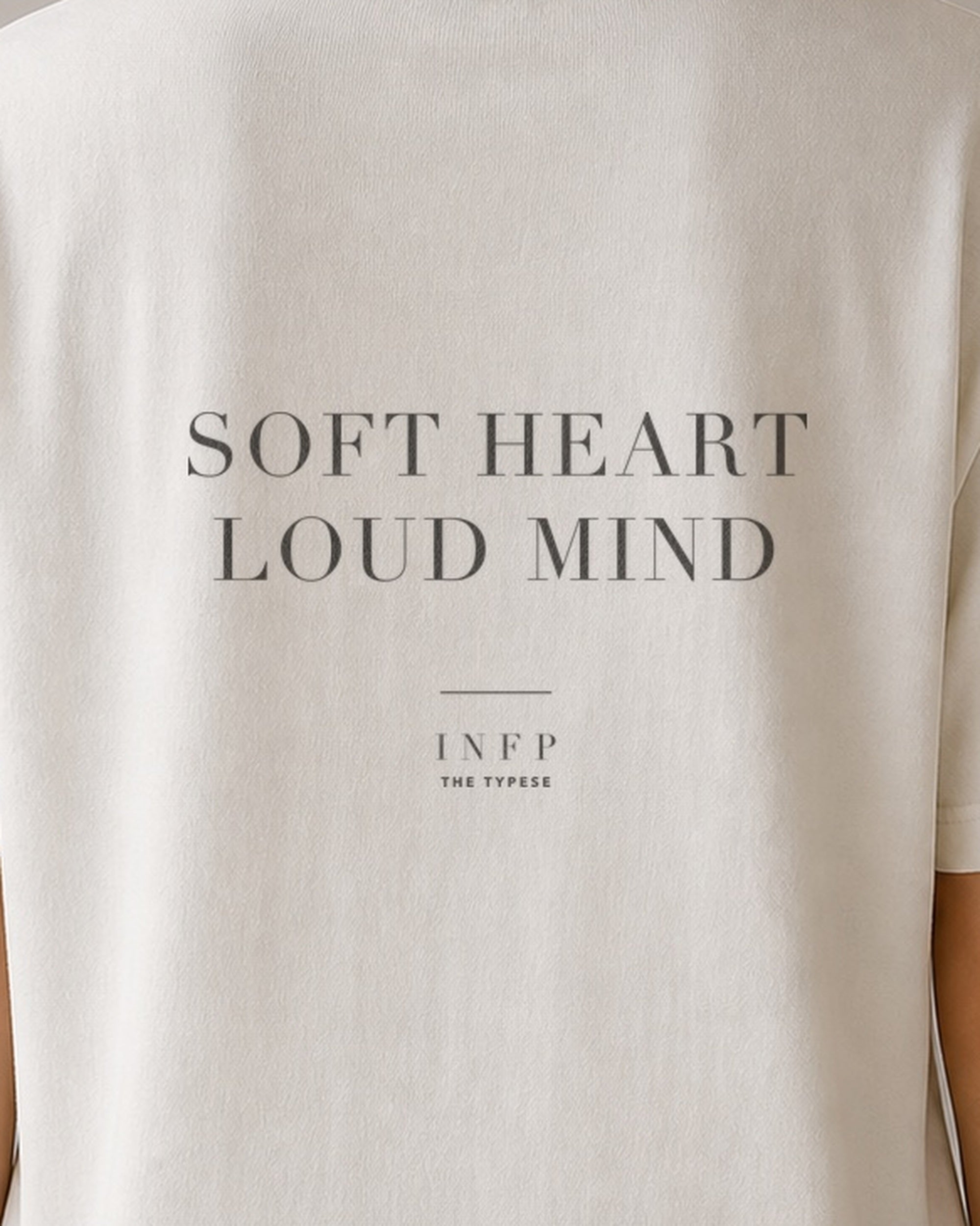 The Typese INFP Comfort Colors Tee in cream white, female back detail