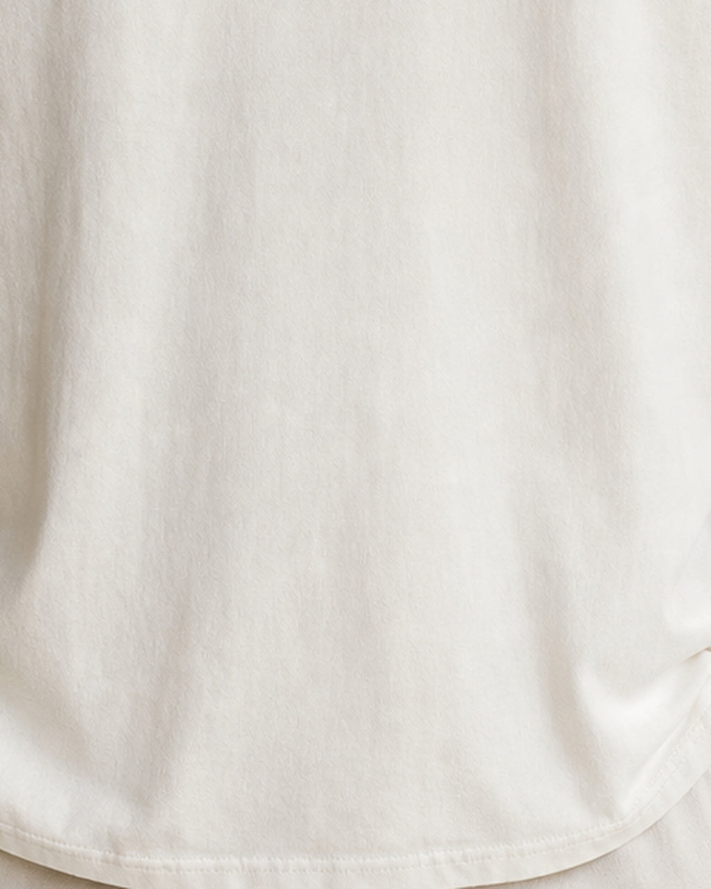 The Typese INFP Comfort Colors Tee in cream white, male fabric detail