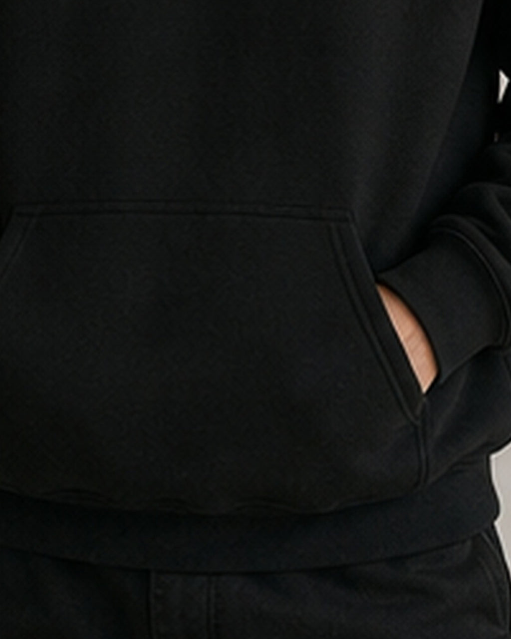 The Typese INFP Gildan hoodie in black, hem pocket detail