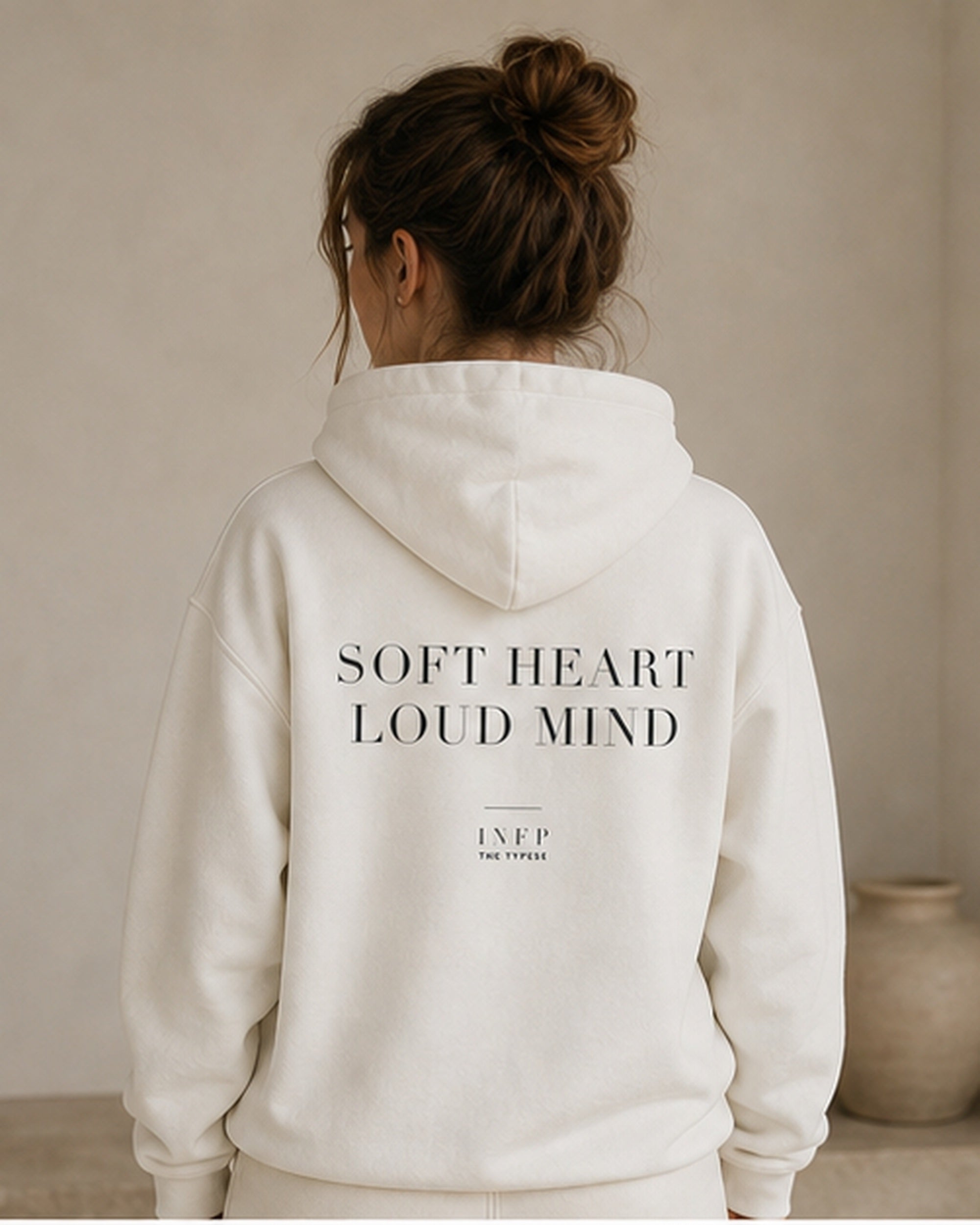 The Typese INFP Gildan hoodie in white, female back