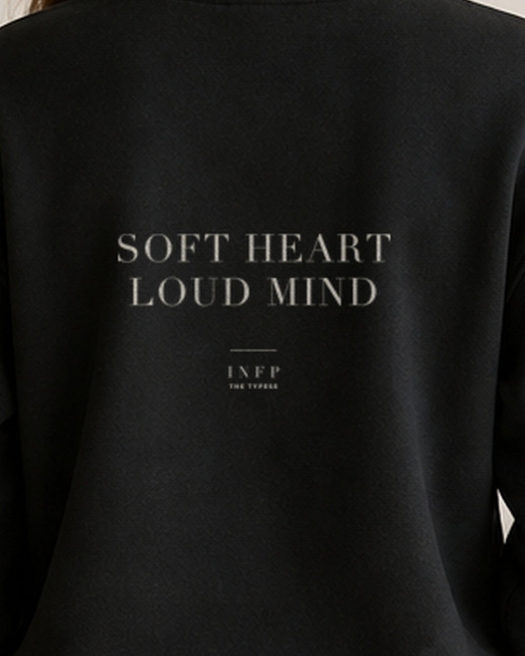 The Typese INFP Gildan crewneck sweatshirt in black, female back print close