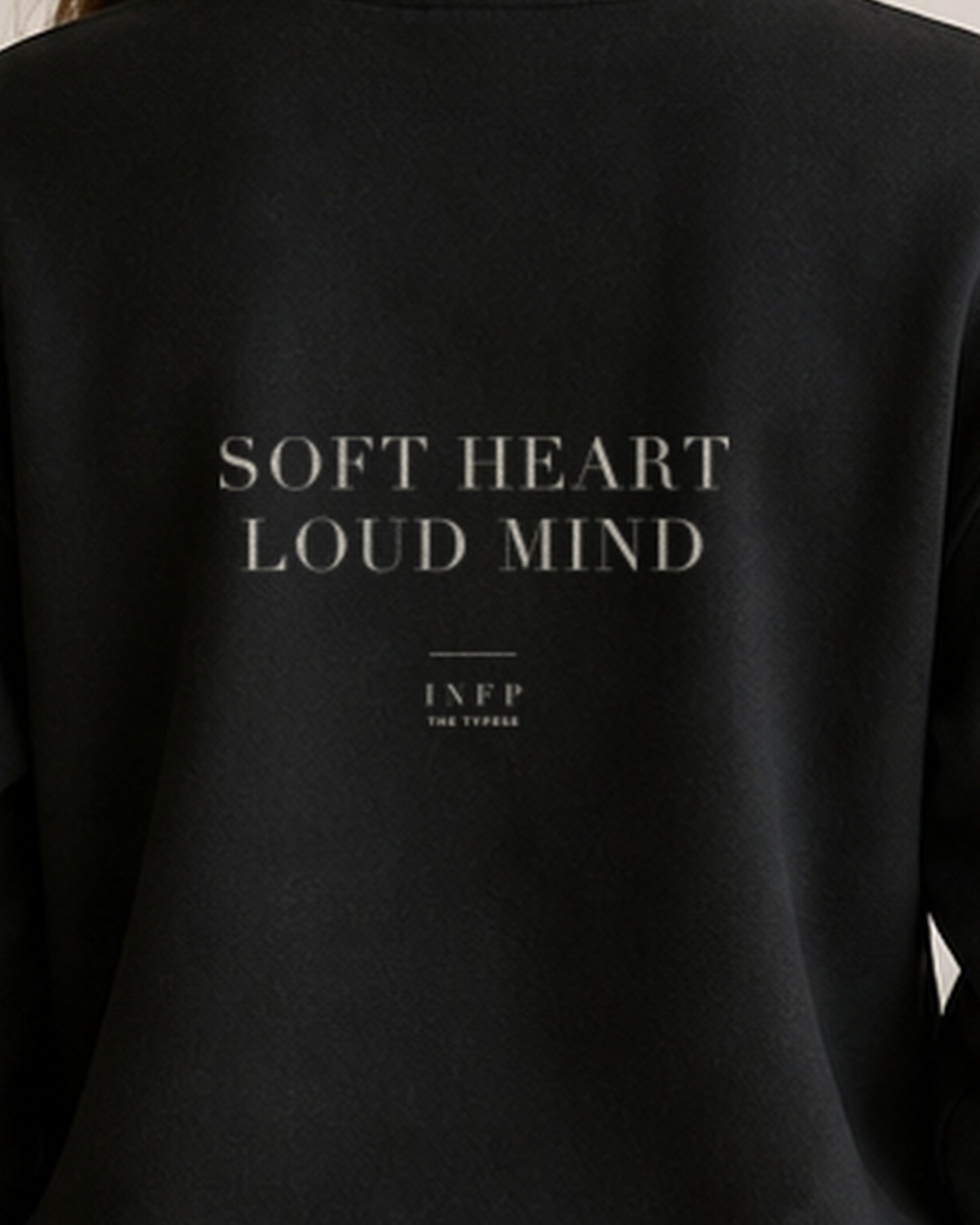 The Typese INFP Gildan crewneck sweatshirt in black, female back print close