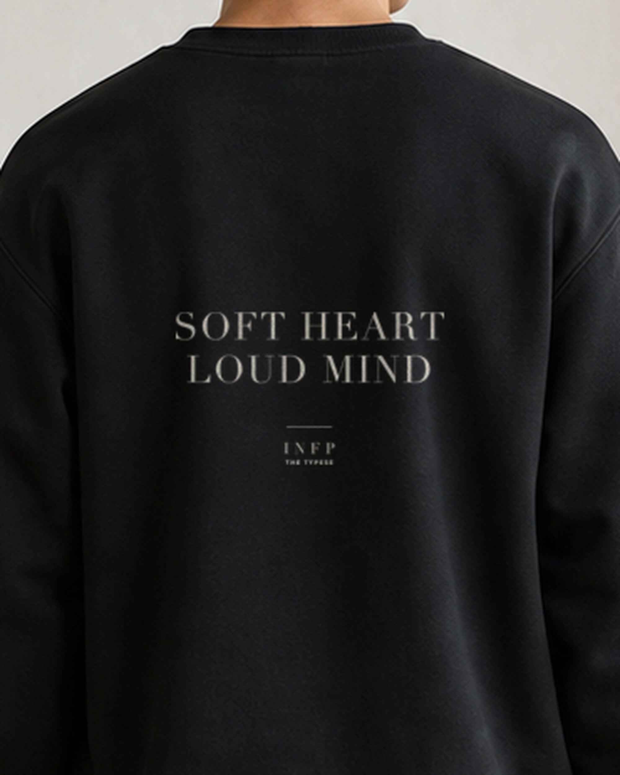 The Typese INFP Gildan crewneck sweatshirt in black, male back detail