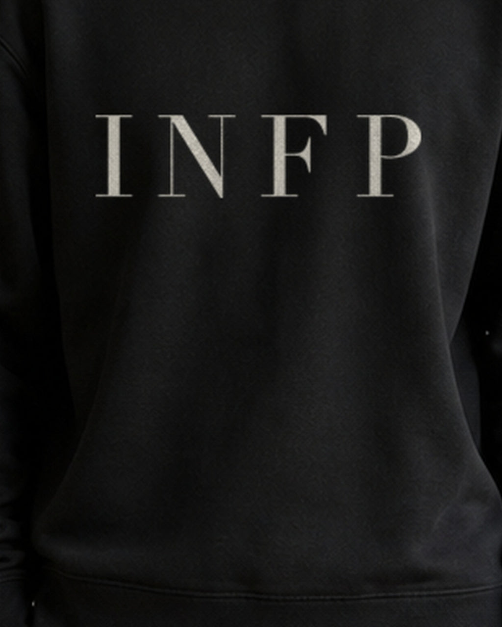 The Typese INFP Gildan crewneck sweatshirt in black, male front print close