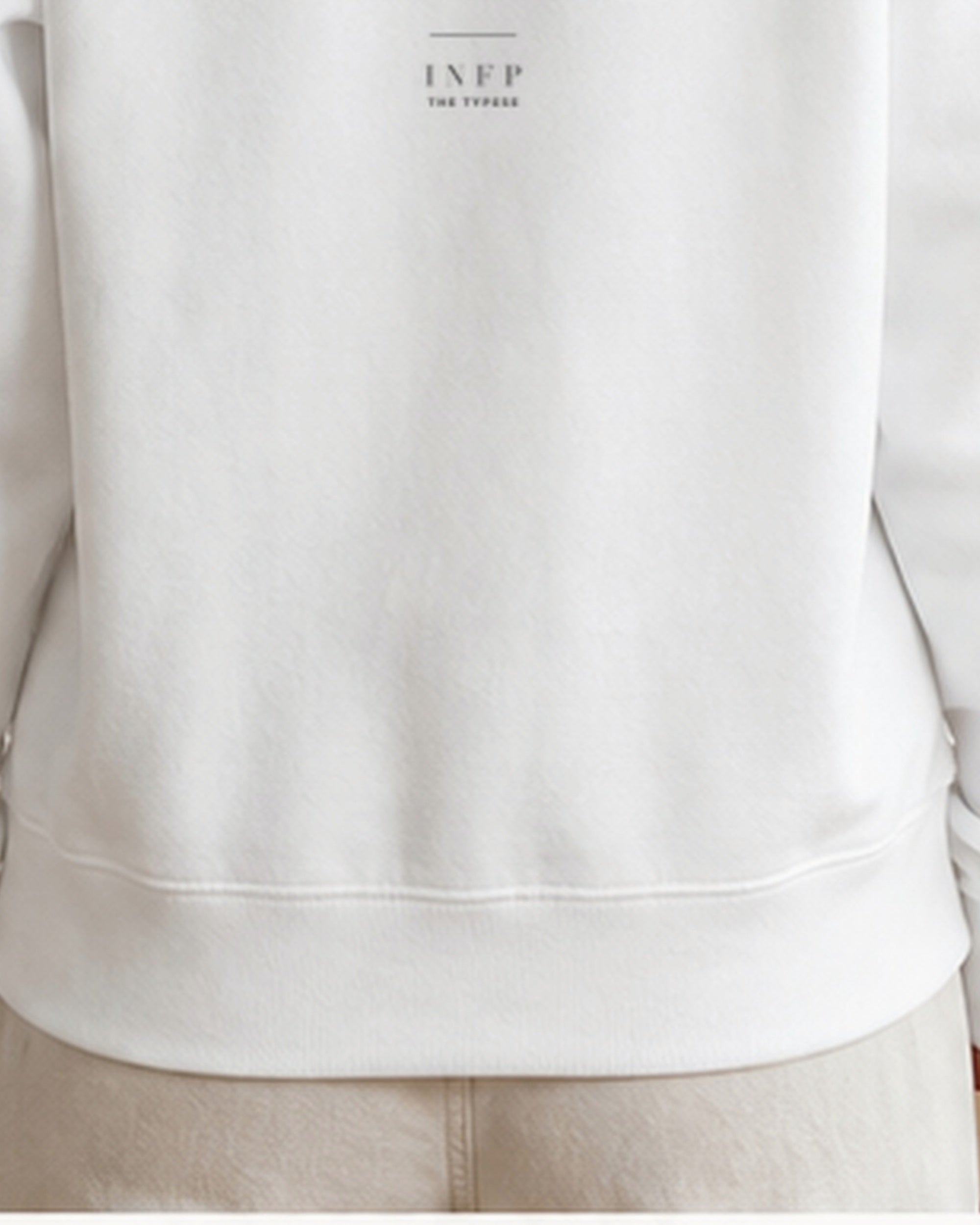 The Typese INFP Gildan crewneck sweatshirt in white, female back hem fleece texture v7