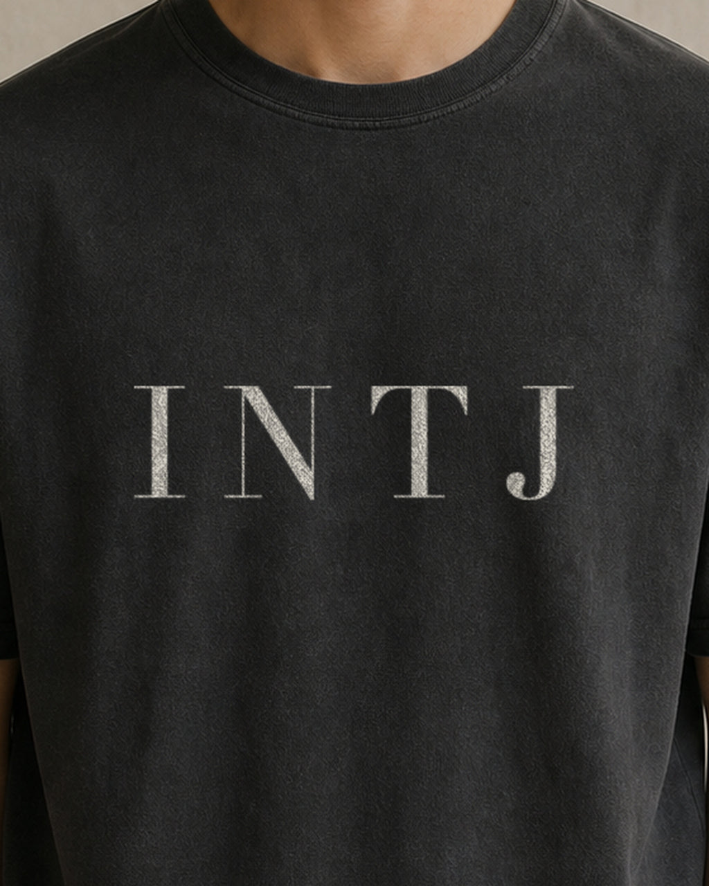 The Typese INTJ Comfort Colors Tee in black, male front detail