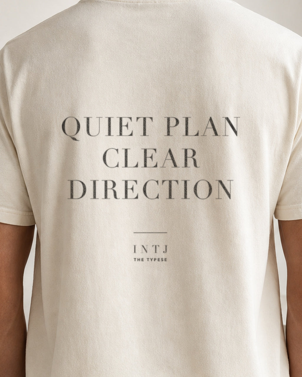 The Typese INTJ Comfort Colors Tee in cream white, male back detail