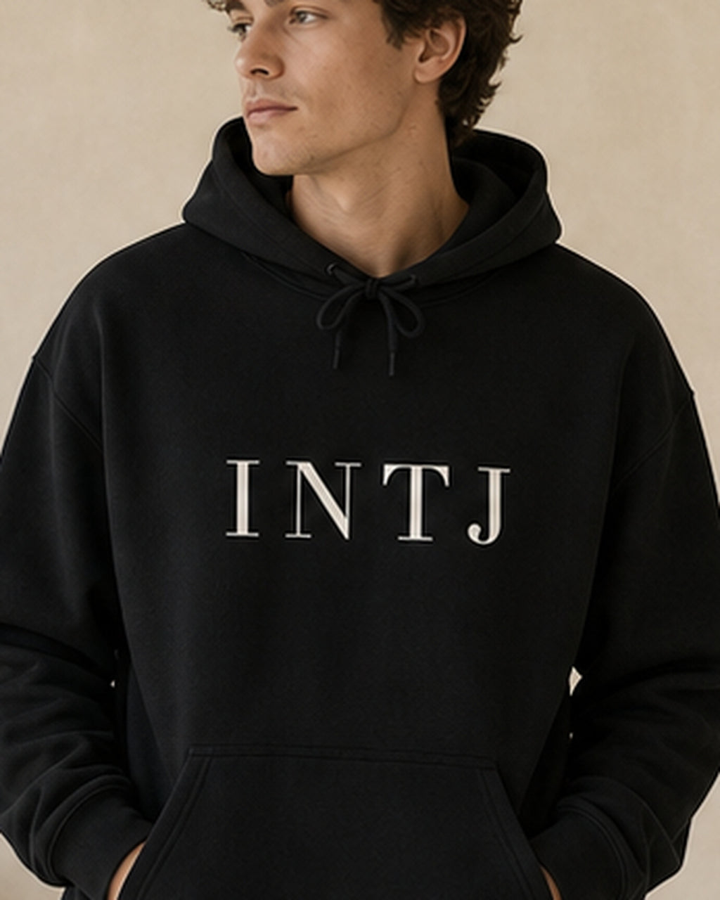 The Typese INTJ Gildan hoodie in black, male front detail