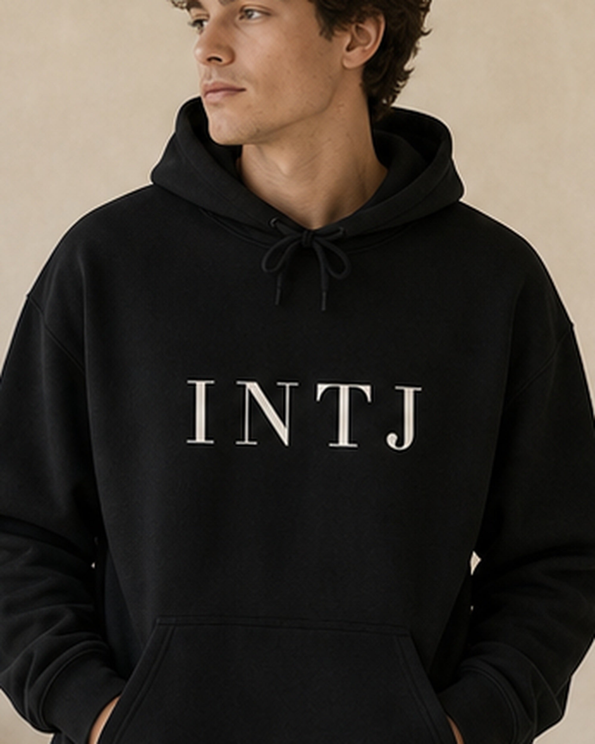 The Typese INTJ Gildan hoodie in black, male front detail