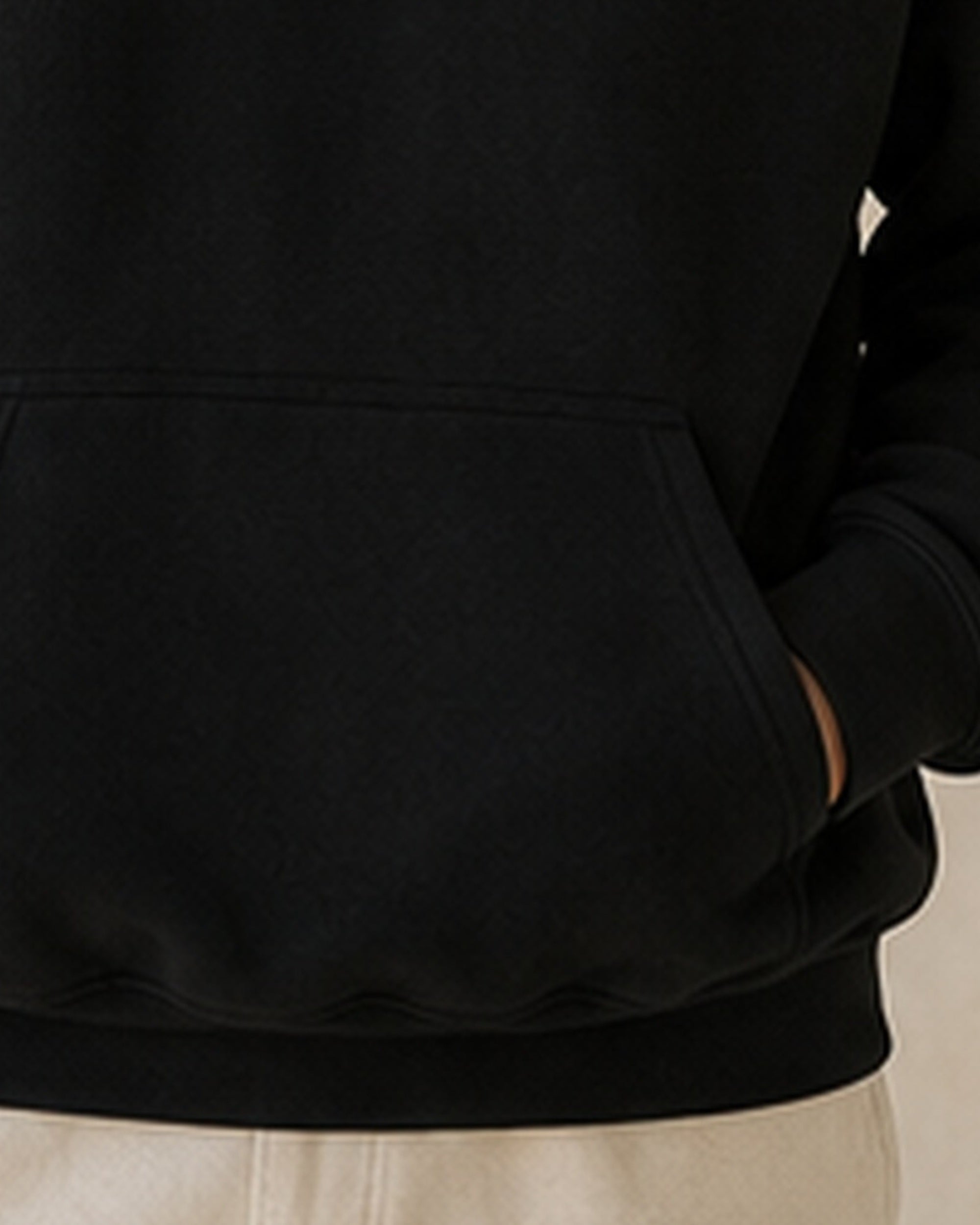 The Typese INTJ Gildan hoodie in black, hem pocket detail
