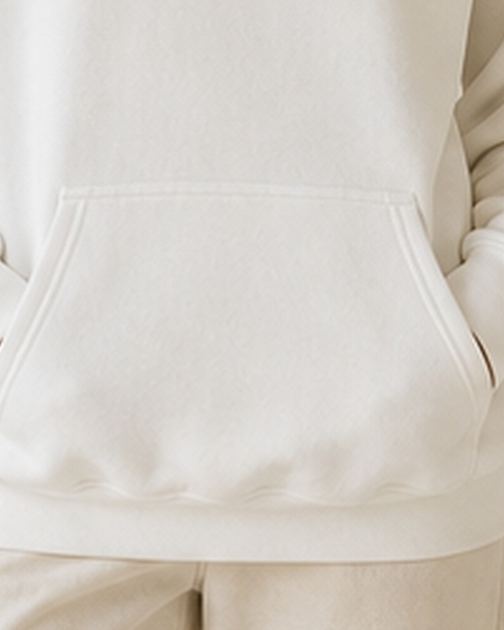 The Typese INTJ Gildan hoodie in white, hem pocket detail