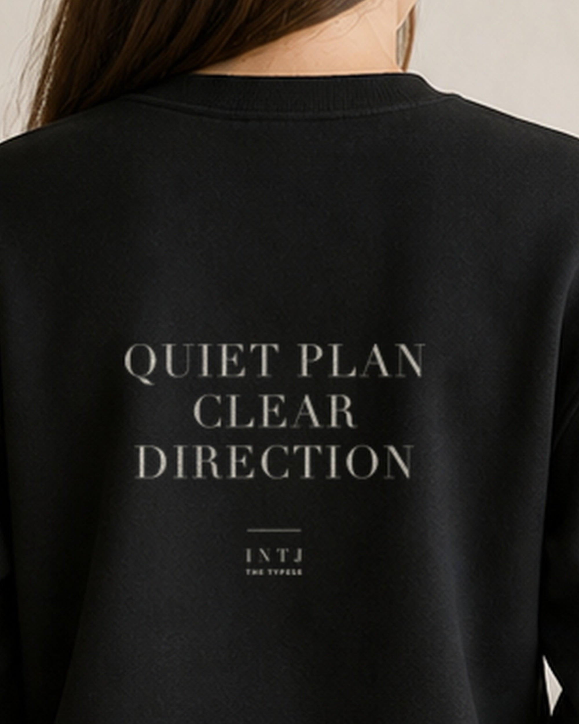 The Typese INTJ Gildan crewneck sweatshirt in black, female back neckline print
