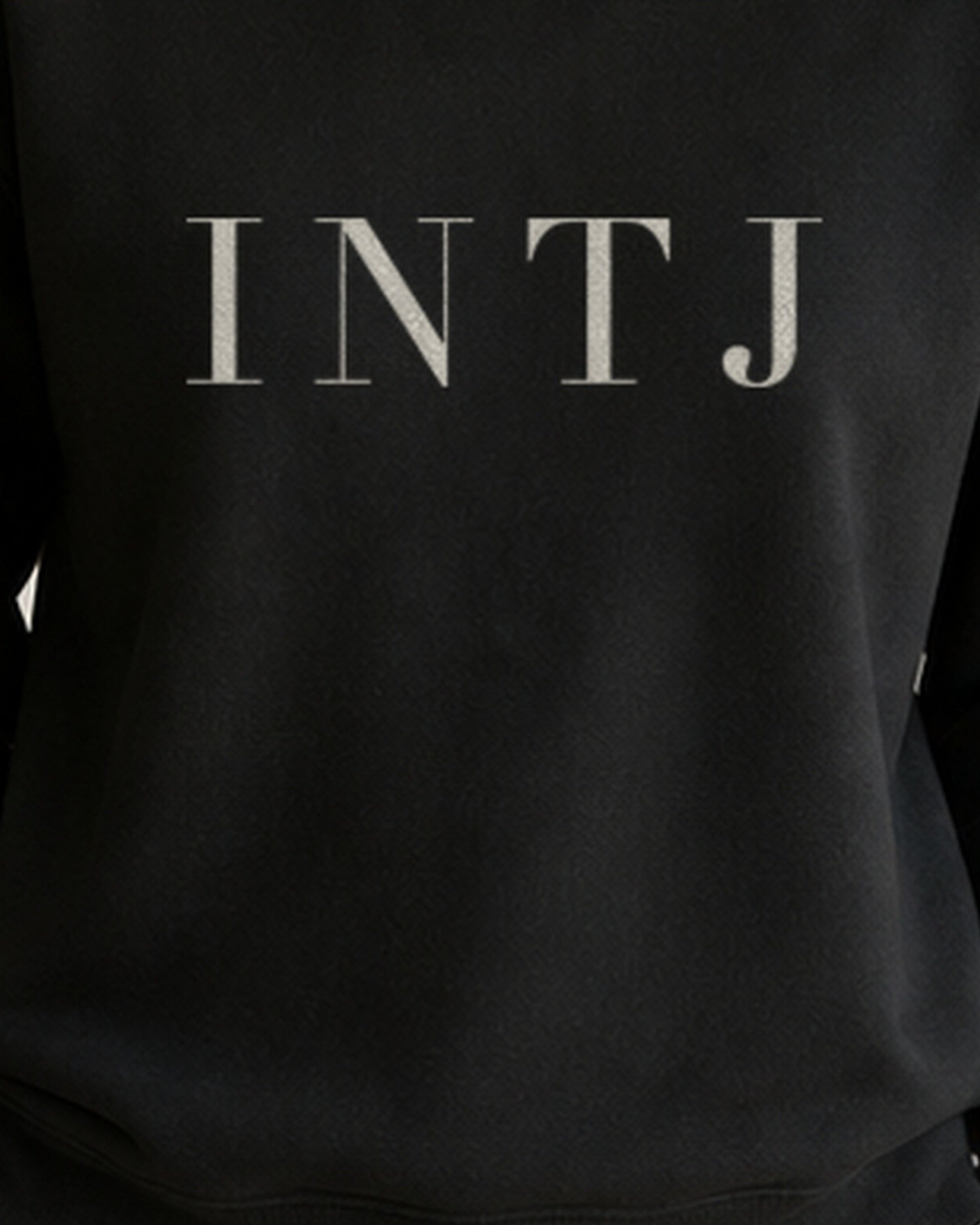 The Typese INTJ Gildan crewneck sweatshirt in black, female front print close