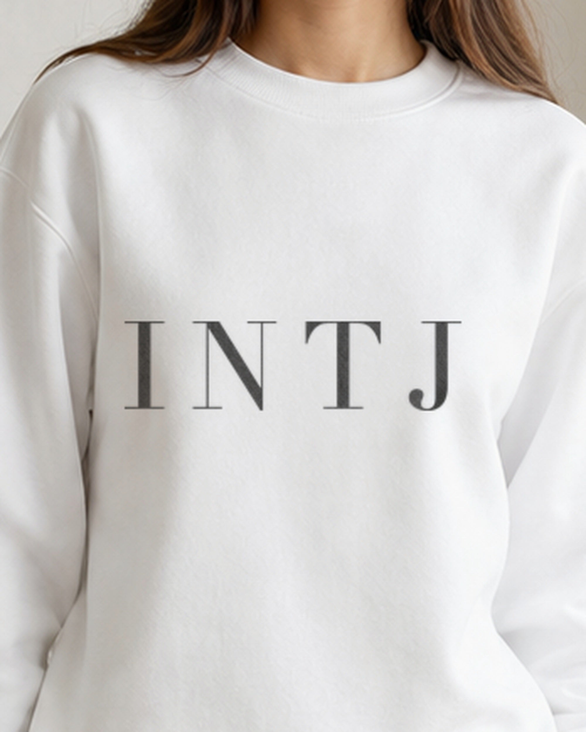 The Typese INTJ Gildan crewneck sweatshirt in white, female front detail v7