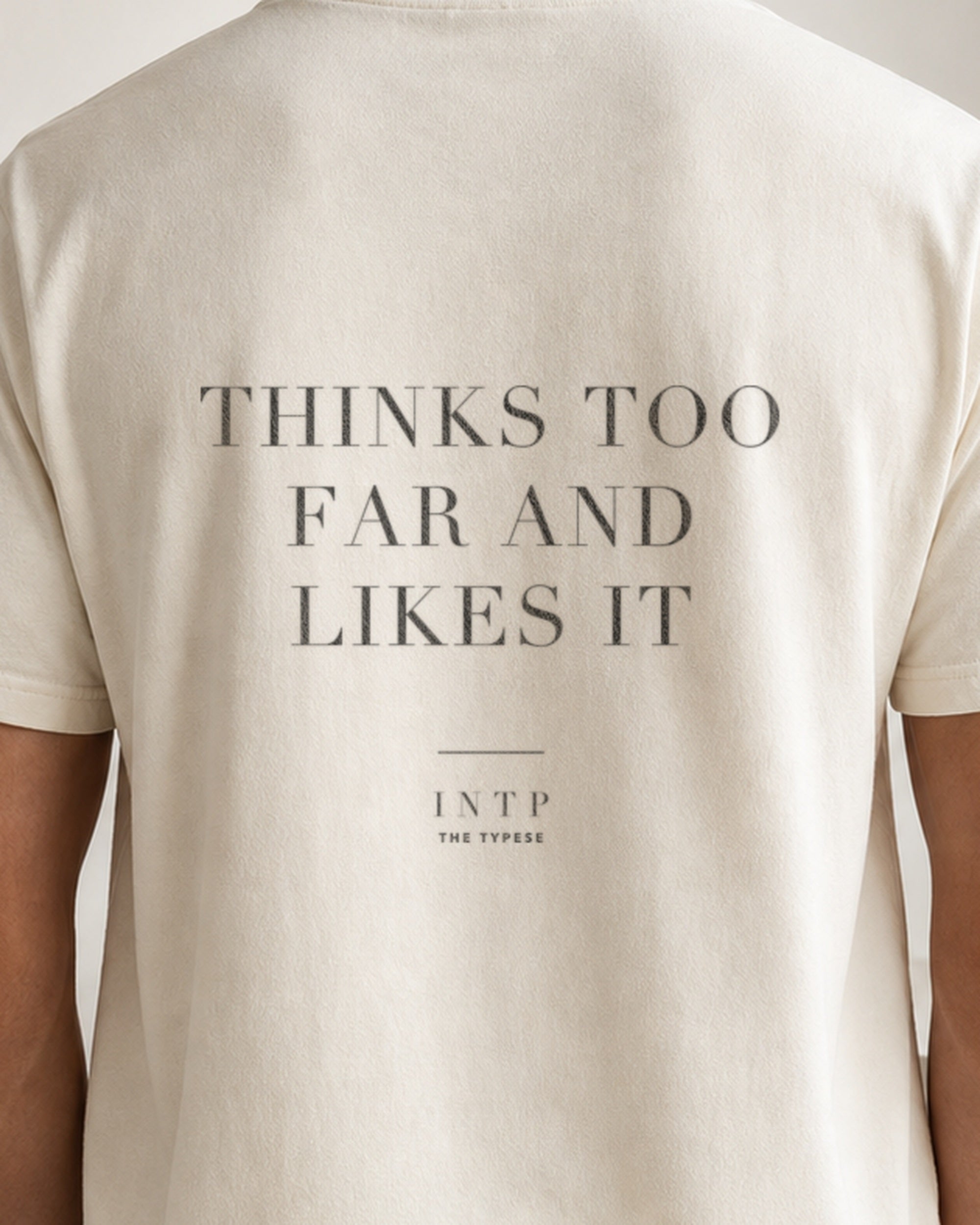 The Typese INTP Comfort Colors Tee in cream white, male back detail