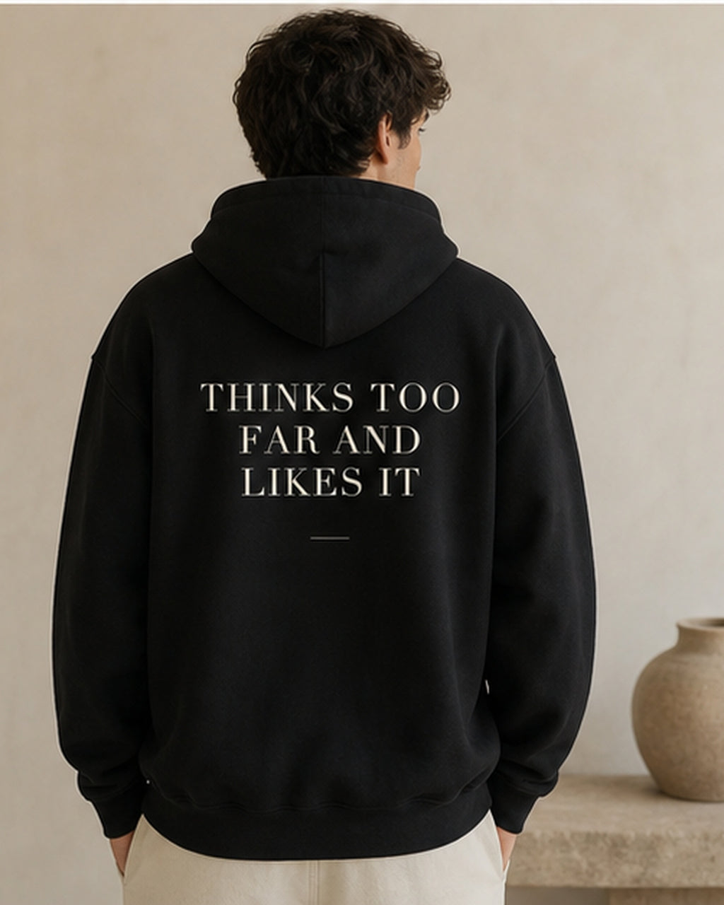 The Typese INTP Gildan hoodie in black, male back