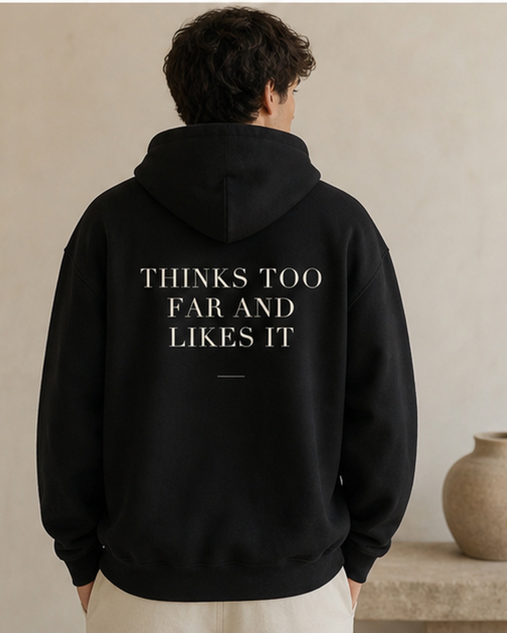 The Typese INTP Gildan hoodie in black, male back