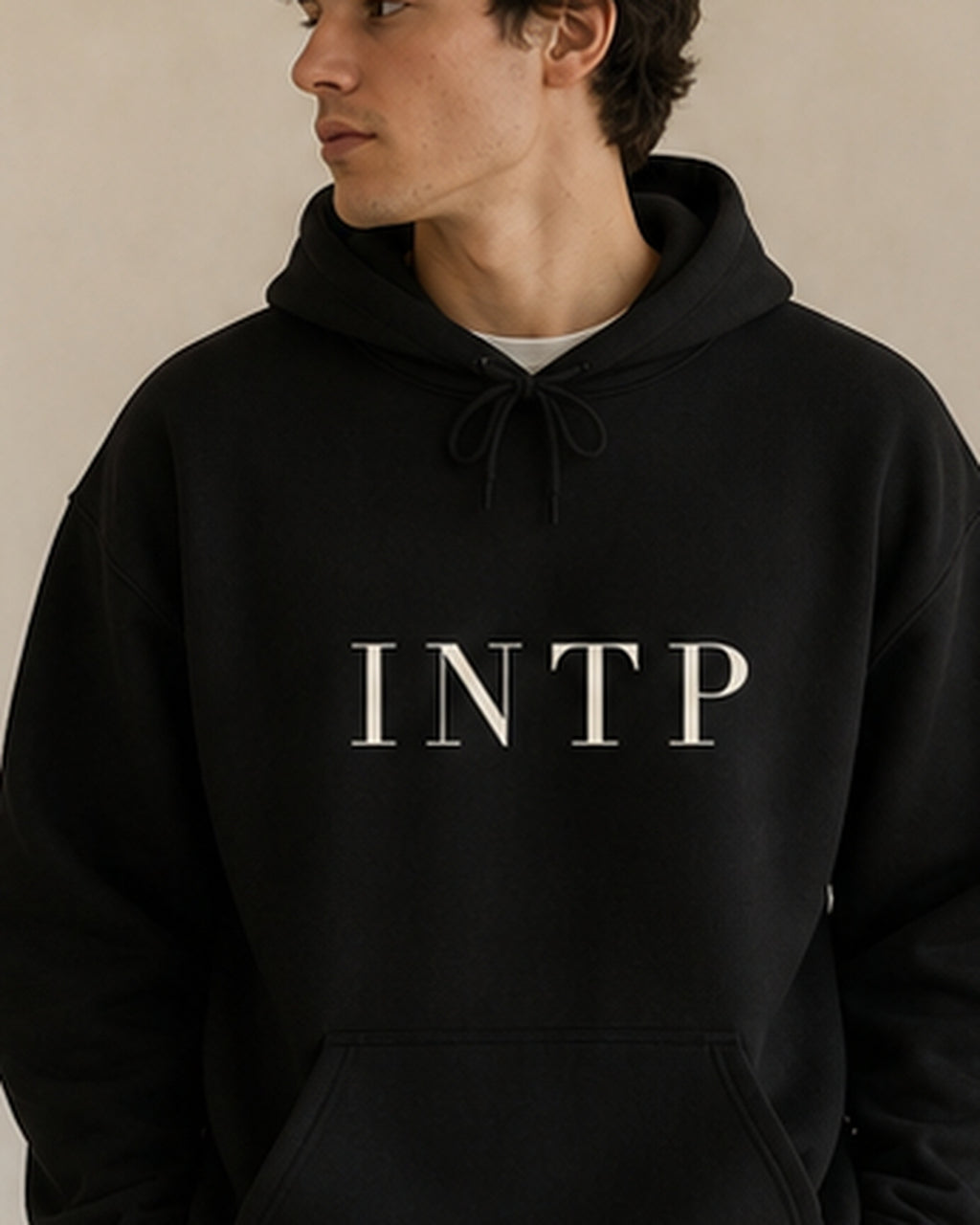 The Typese INTP Gildan hoodie in black, male front detail