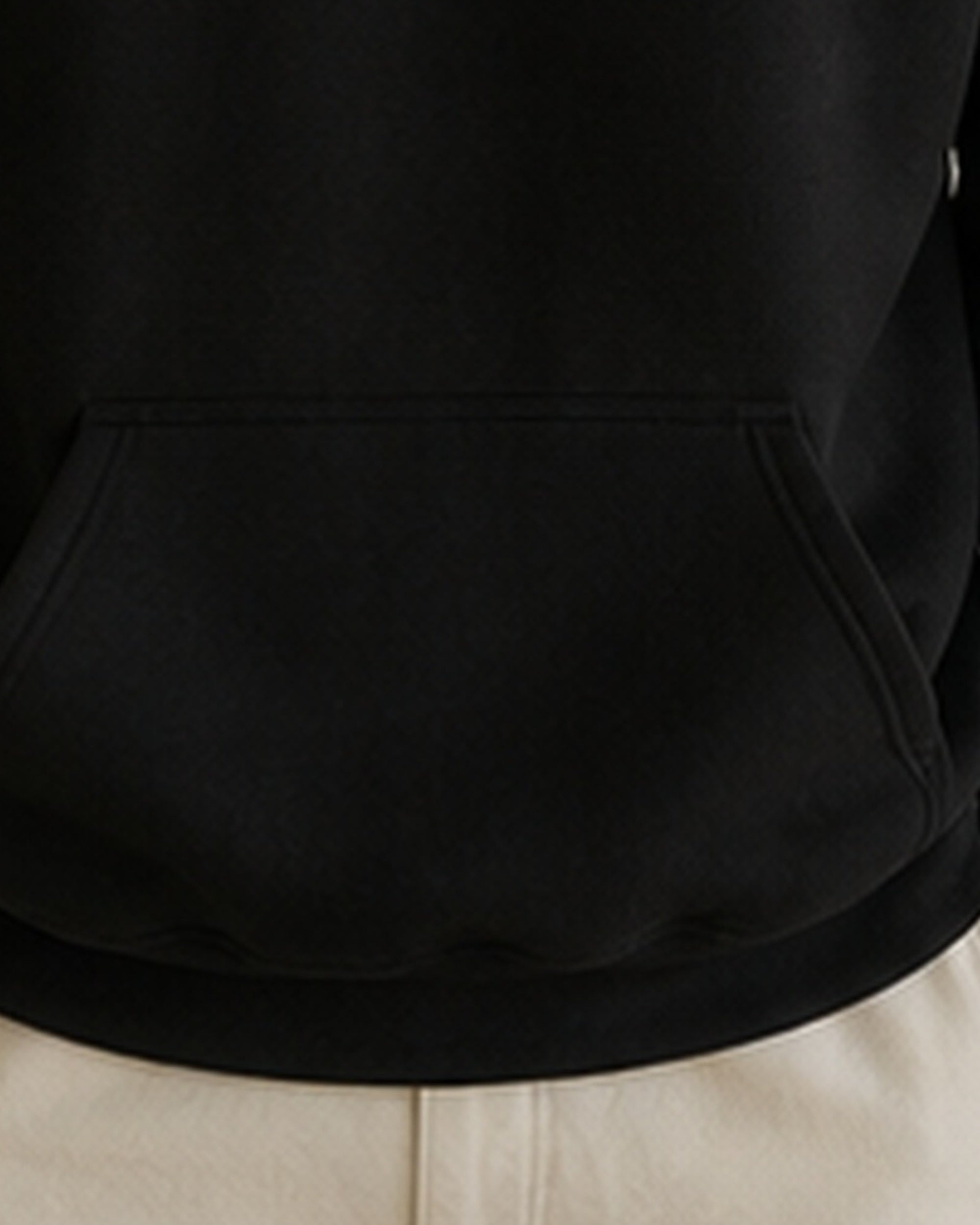 The Typese INTP Gildan hoodie in black, hem pocket detail
