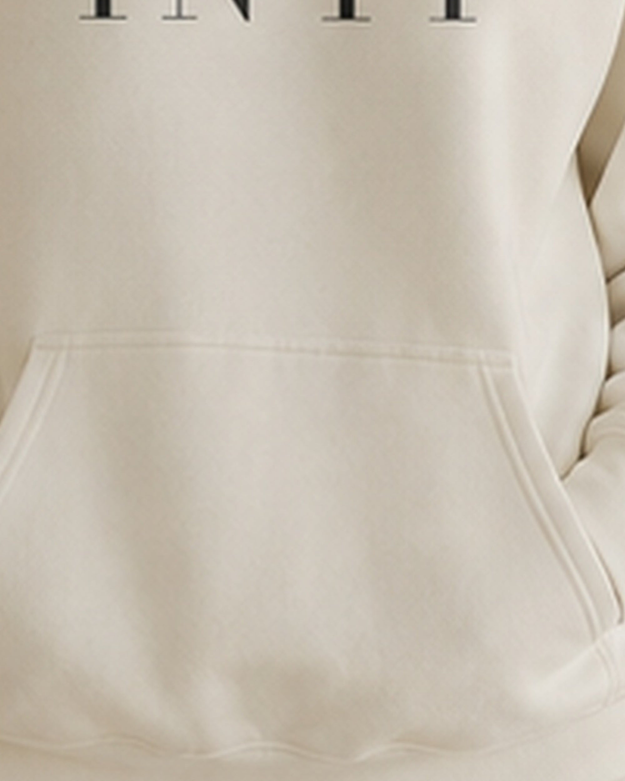 The Typese INTP Gildan hoodie in white, hem pocket detail
