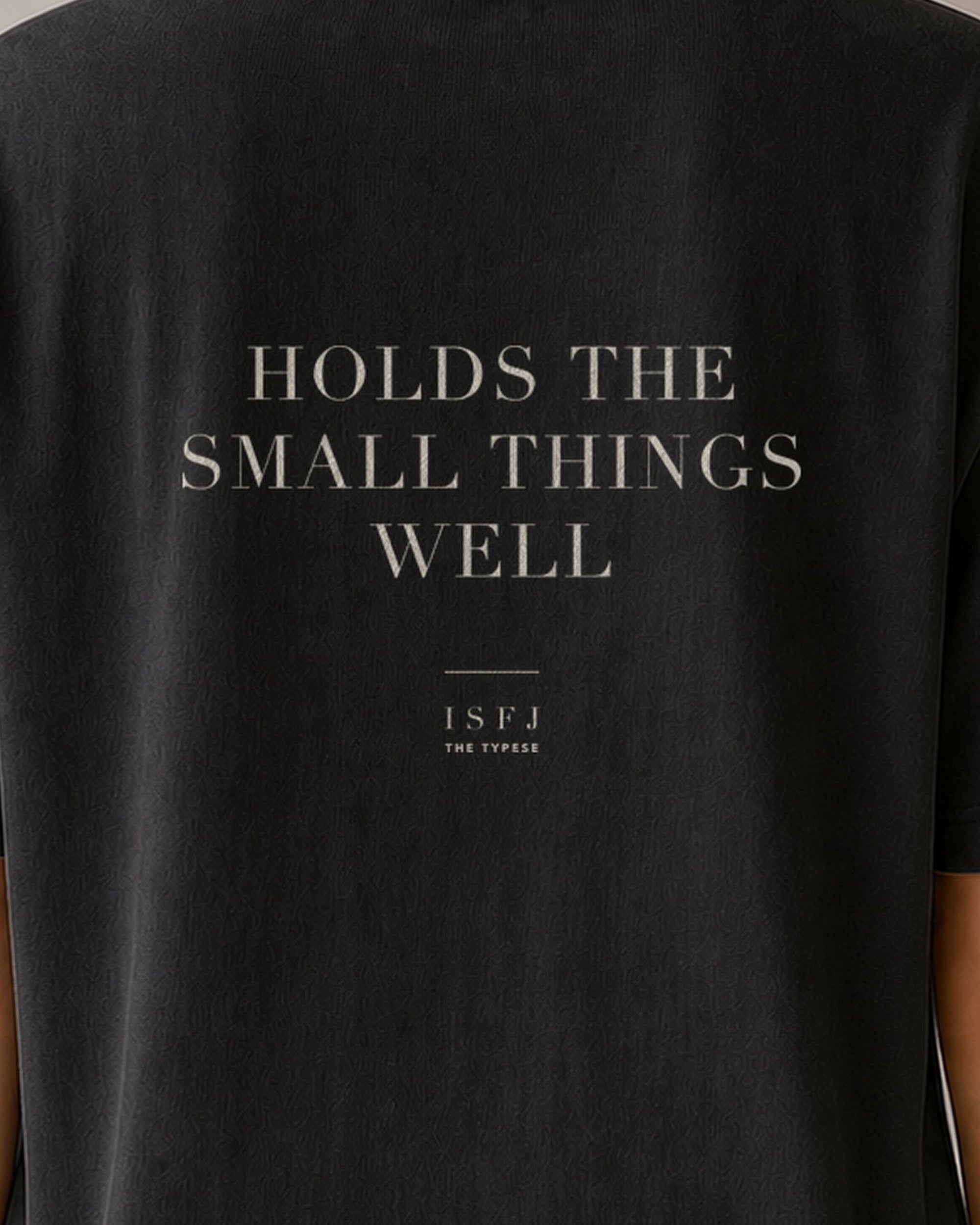 The Typese ISFJ Comfort Colors Tee in black, female back detail
