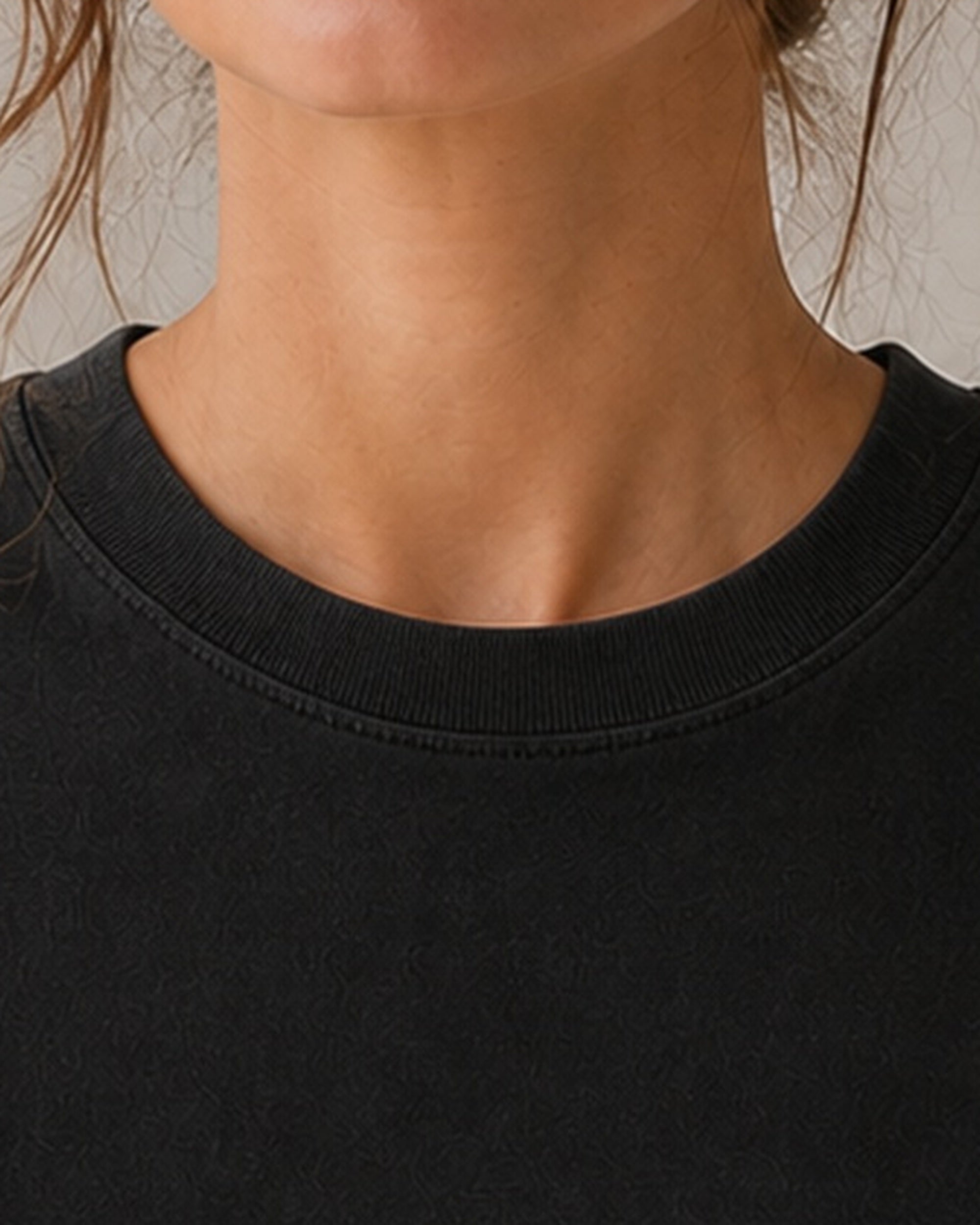 The Typese ISFJ Comfort Colors Tee in black, female collar detail