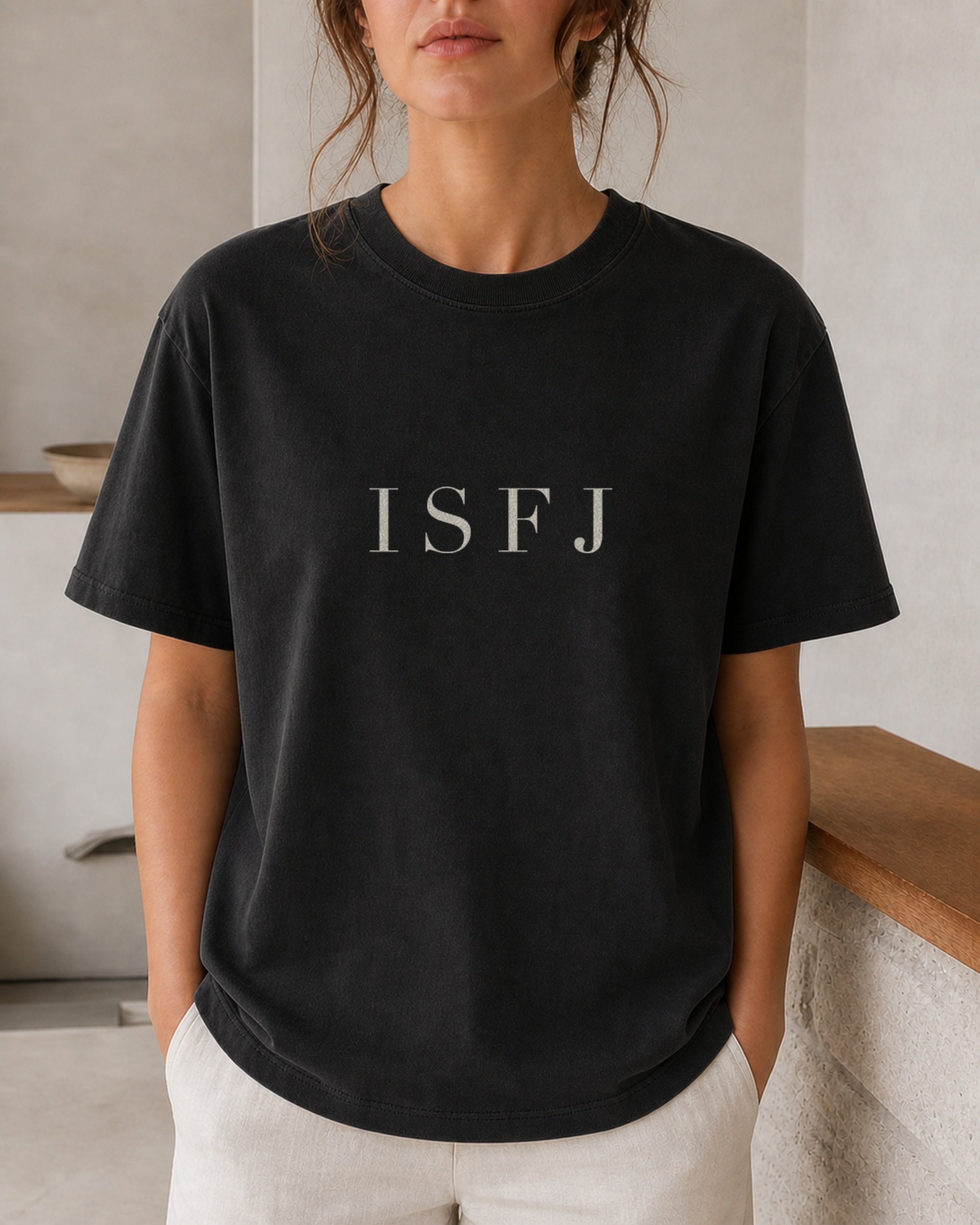 The Typese ISFJ Comfort Colors Tee in black, female front