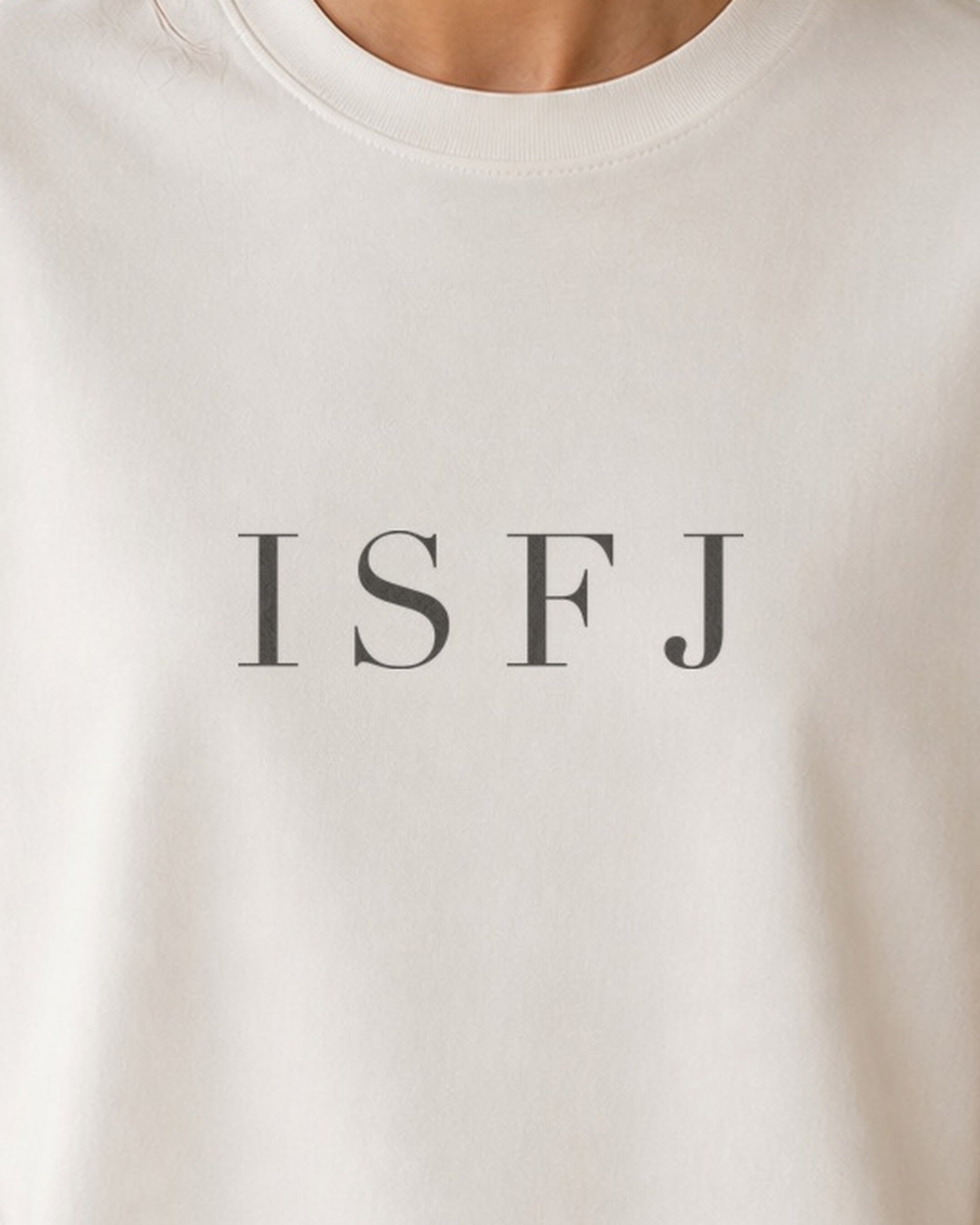The Typese ISFJ Comfort Colors Tee in cream white, female front detail