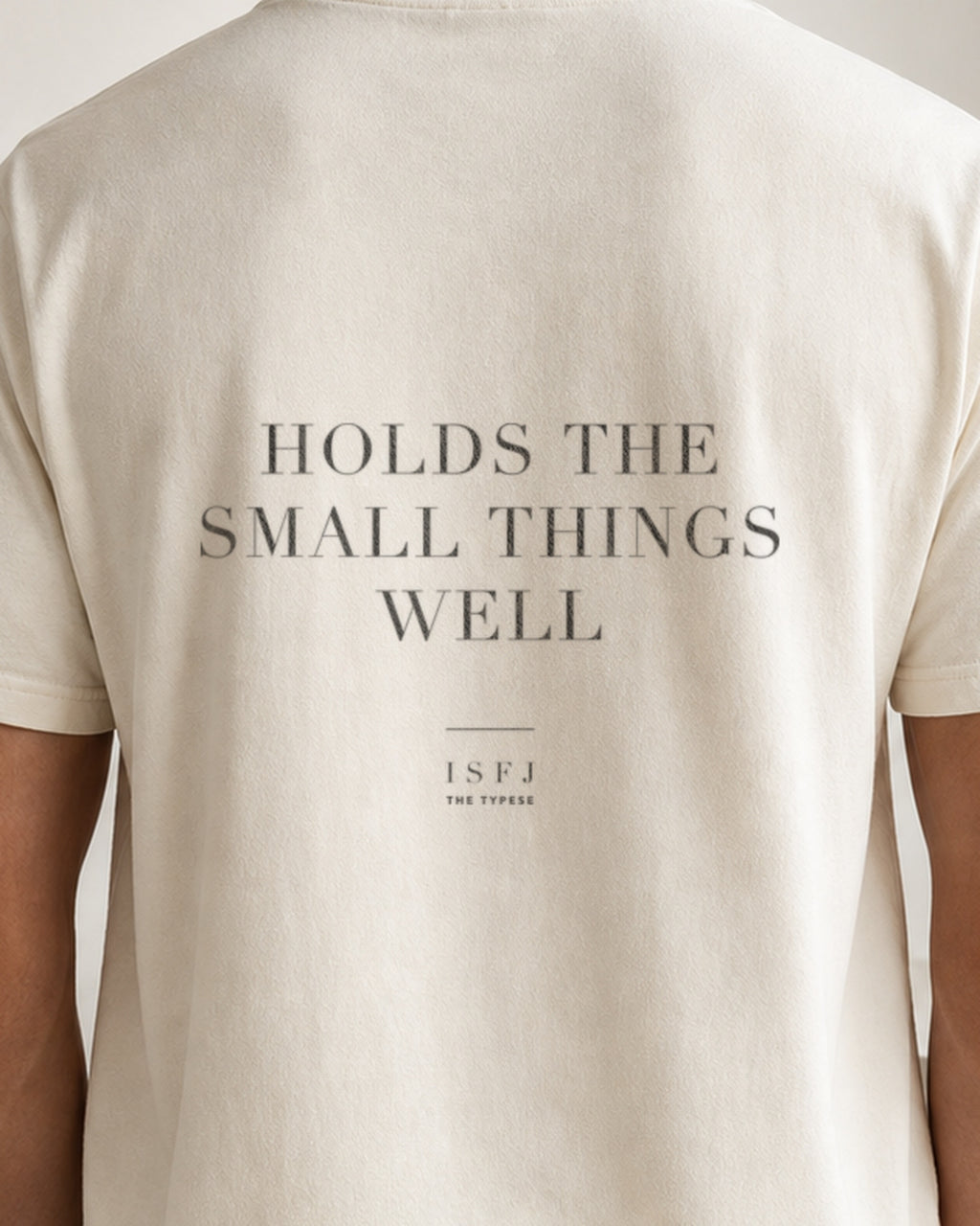 The Typese ISFJ Comfort Colors Tee in cream white, male back detail