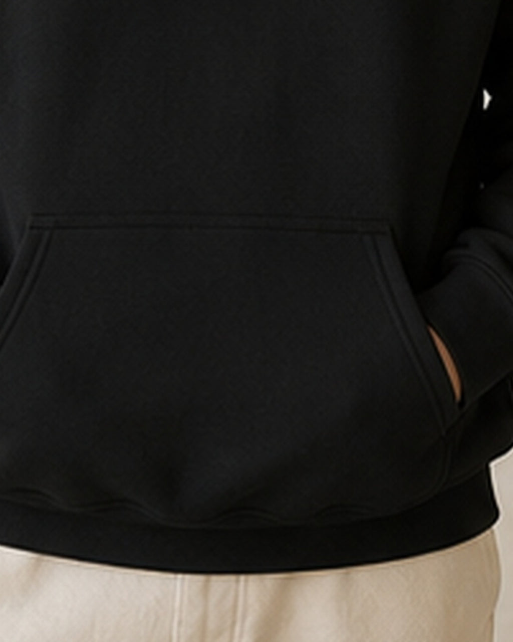 The Typese ISFJ Gildan hoodie in black, hem pocket detail