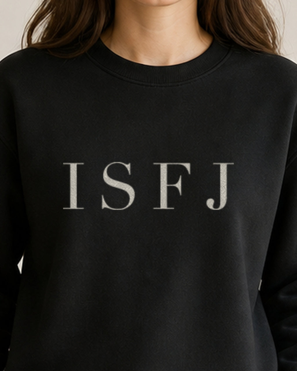 The Typese ISFJ Gildan crewneck sweatshirt in black, female front detail