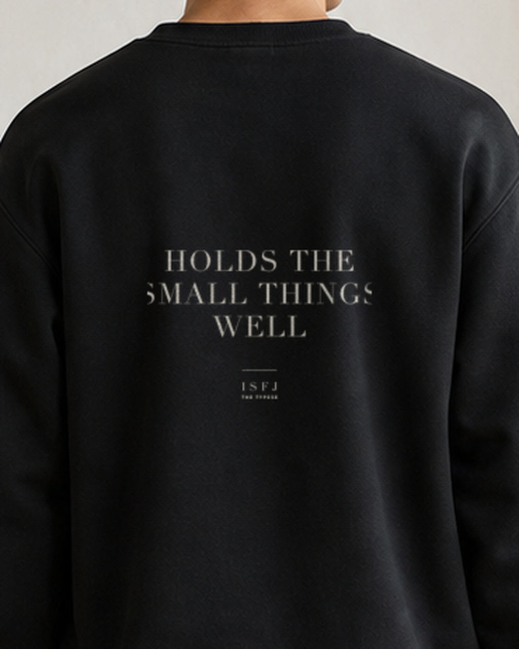 The Typese ISFJ Gildan crewneck sweatshirt in black, male back detail