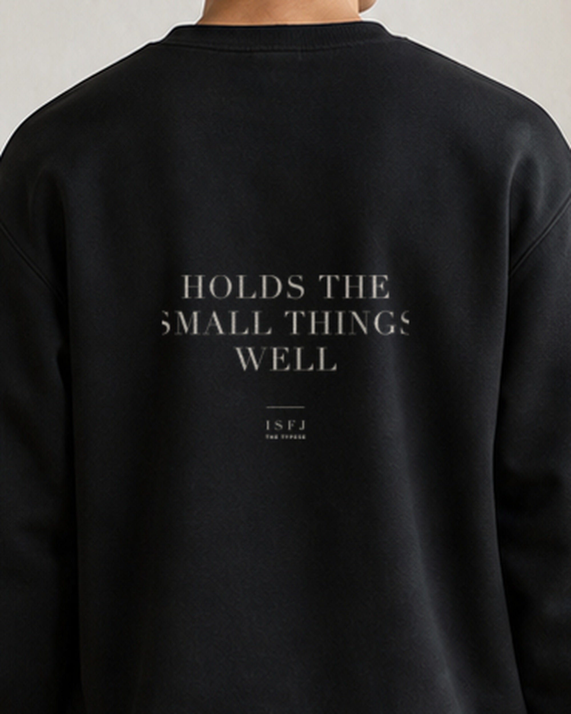 The Typese ISFJ Gildan crewneck sweatshirt in black, male back detail