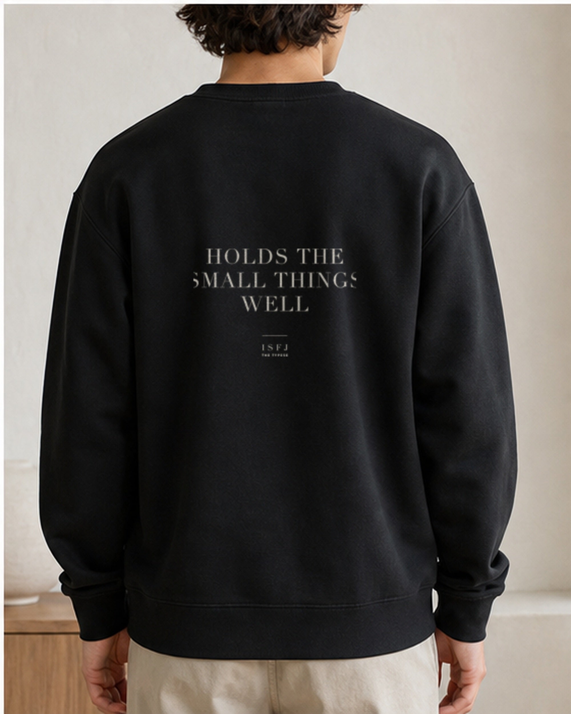 The Typese ISFJ Gildan crewneck sweatshirt in black, male back
