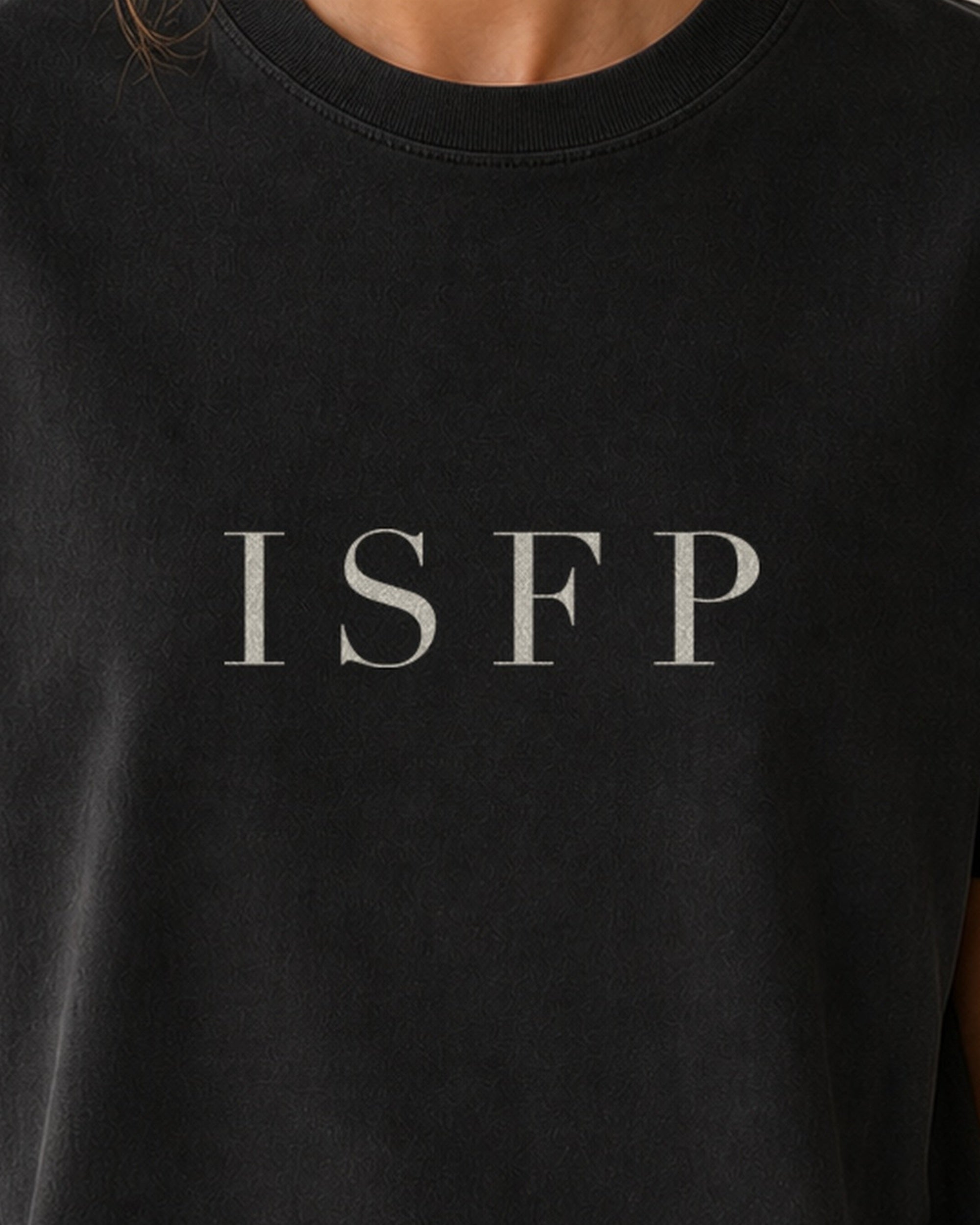 The Typese ISFP Comfort Colors Tee in black, female front detail