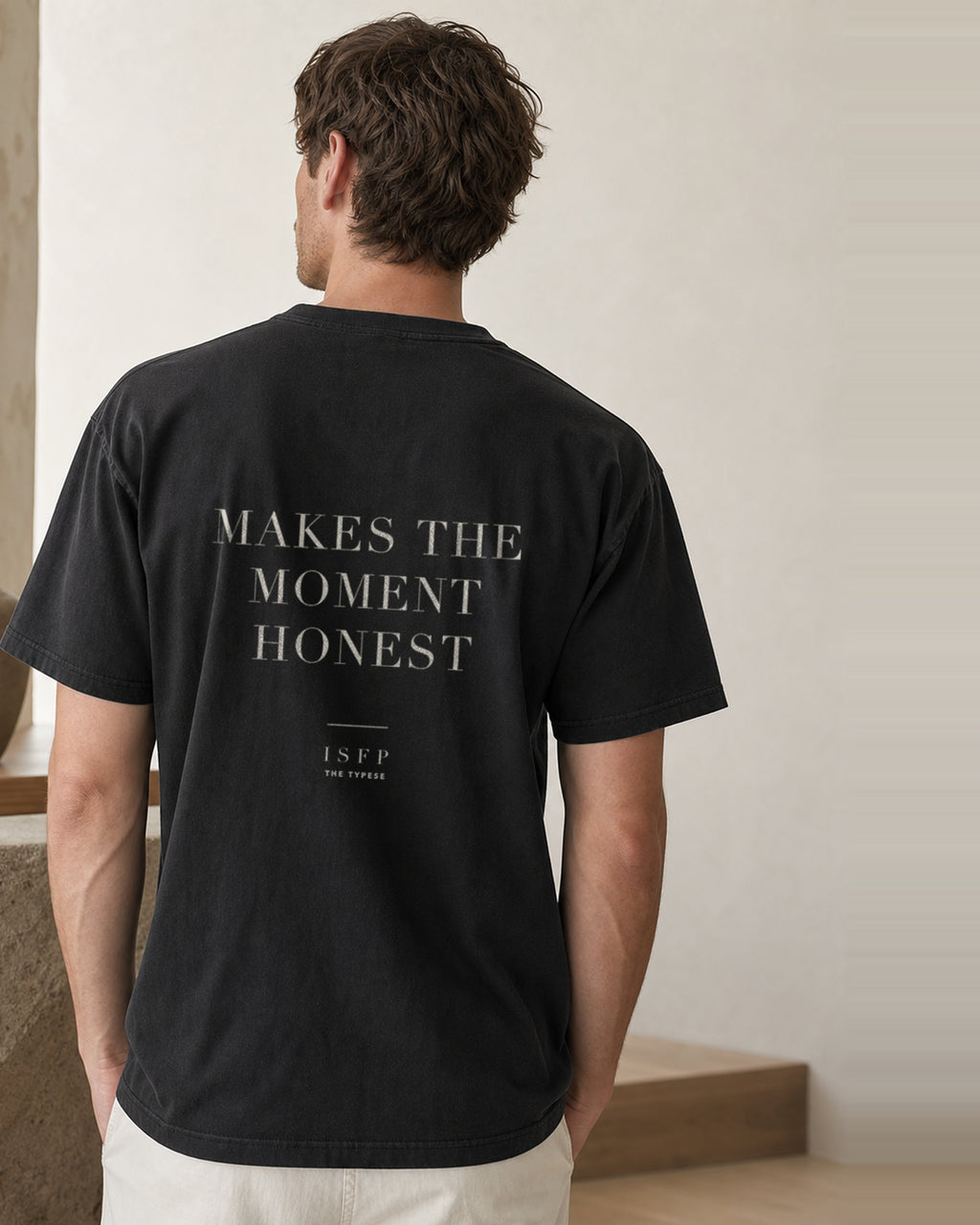 The Typese ISFP Comfort Colors Tee in black, male back