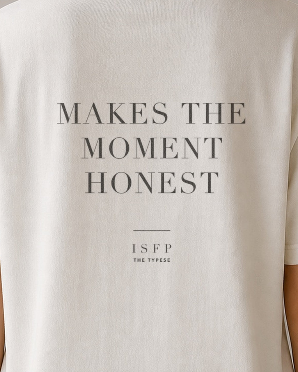 The Typese ISFP Comfort Colors Tee in cream white, female back detail
