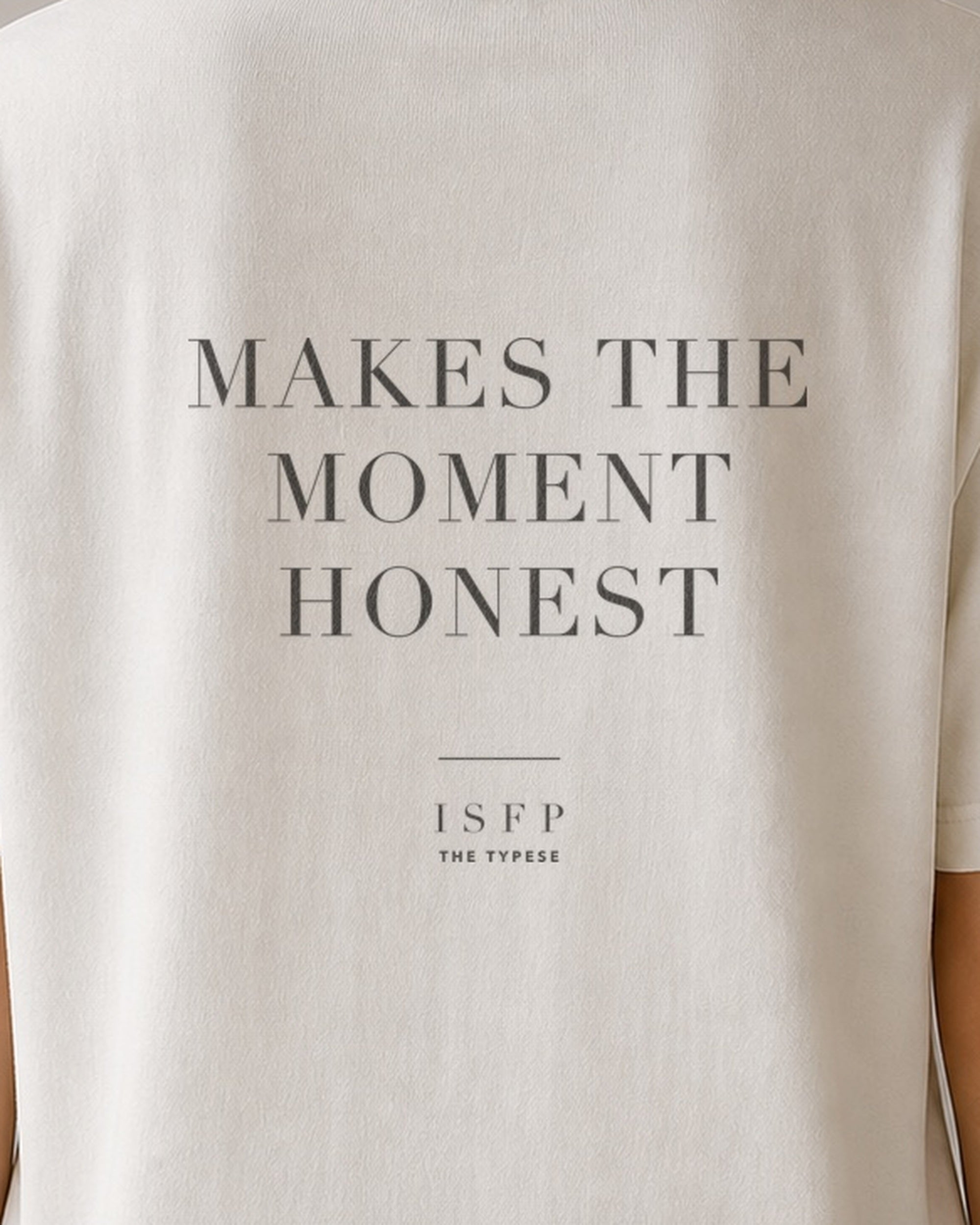 The Typese ISFP Comfort Colors Tee in cream white, female back detail