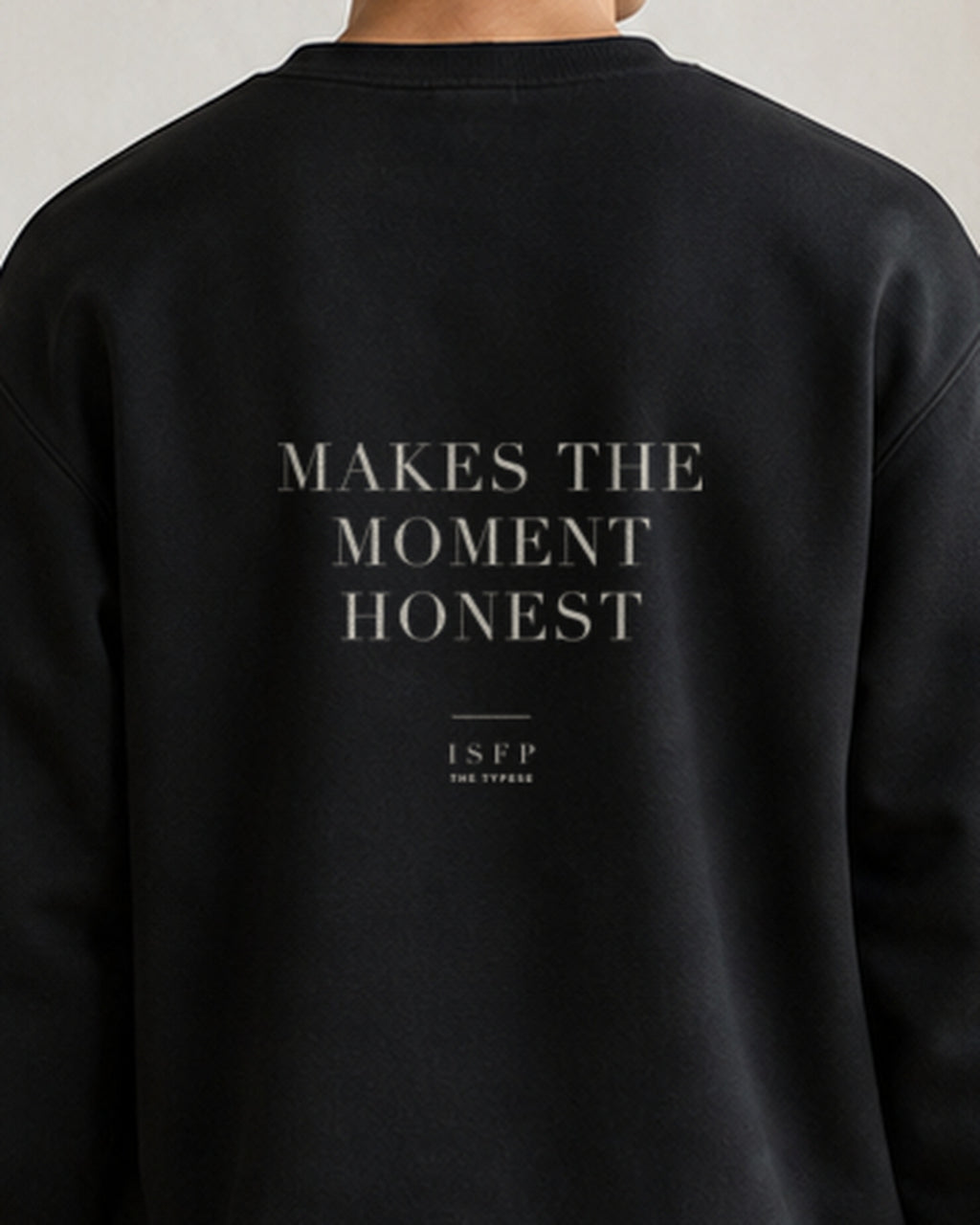 The Typese ISFP Gildan crewneck sweatshirt in black, male back detail