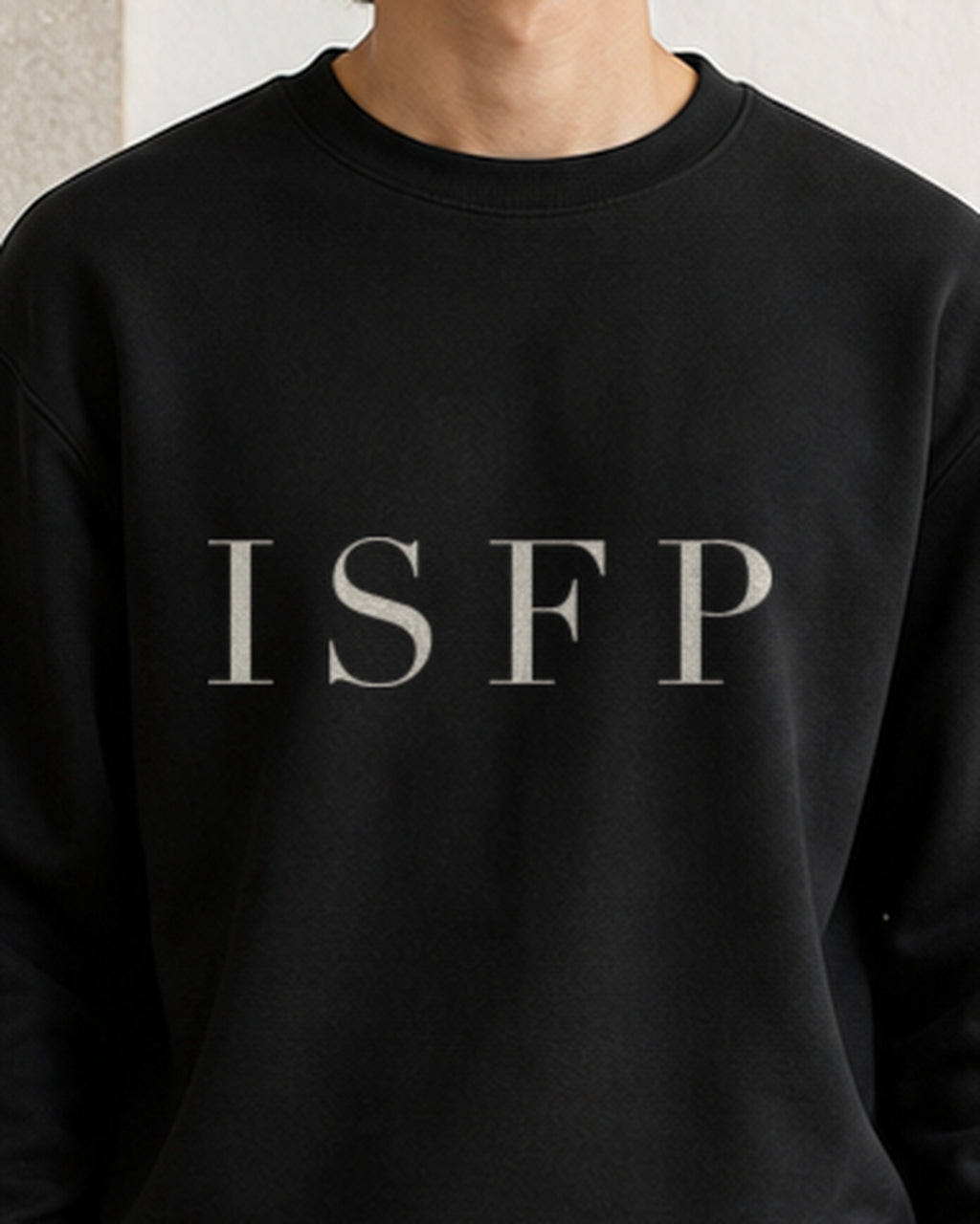 The Typese ISFP Gildan crewneck sweatshirt in black, male front detail