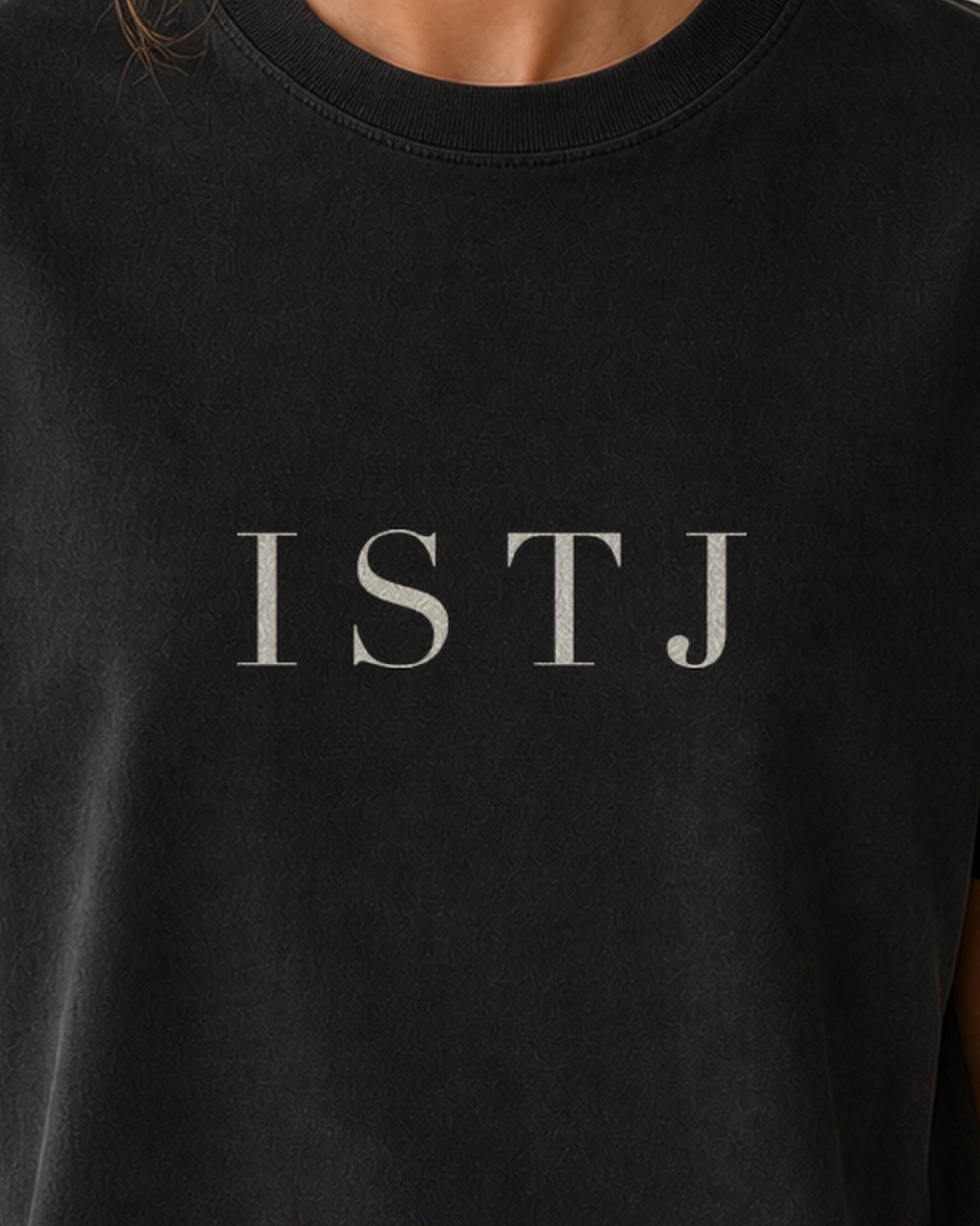 The Typese ISTJ Comfort Colors Tee in black, female front detail