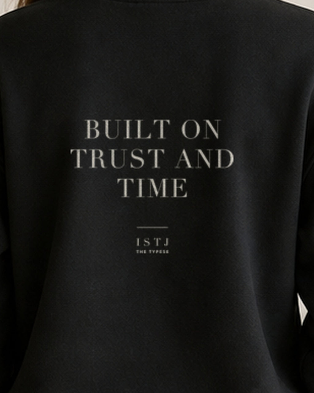 The Typese ISTJ Gildan crewneck sweatshirt in black, female back print close