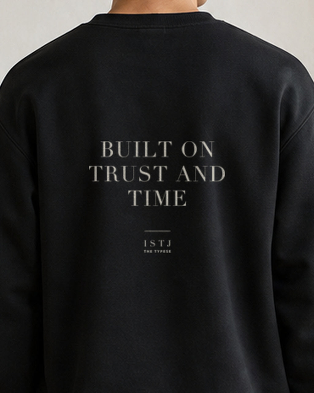 The Typese ISTJ Gildan crewneck sweatshirt in black, male back detail