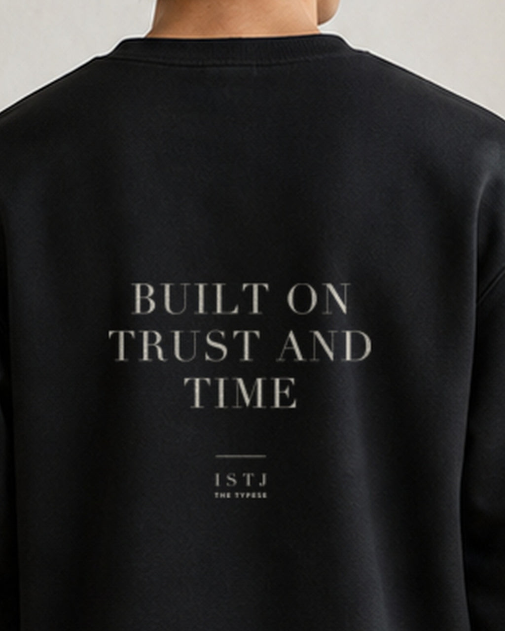 The Typese ISTJ Gildan crewneck sweatshirt in black, male back neckline print