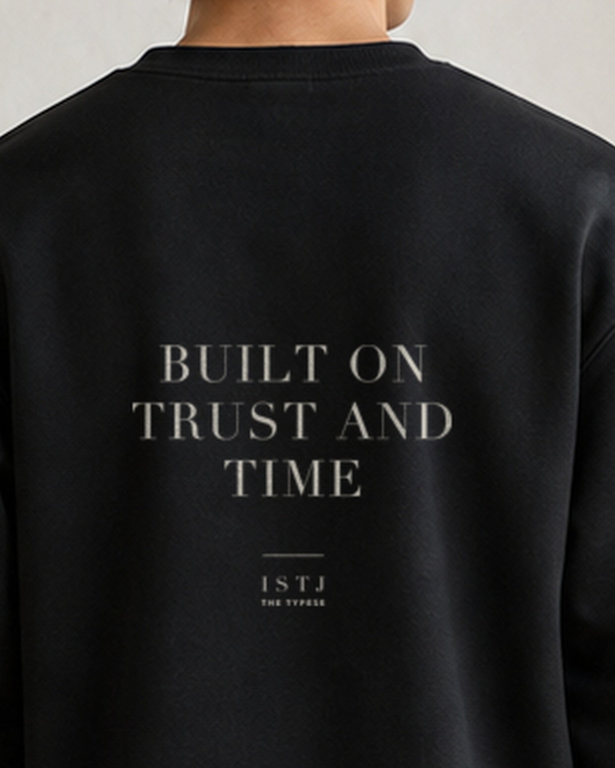The Typese ISTJ Gildan crewneck sweatshirt in black, male back neckline print