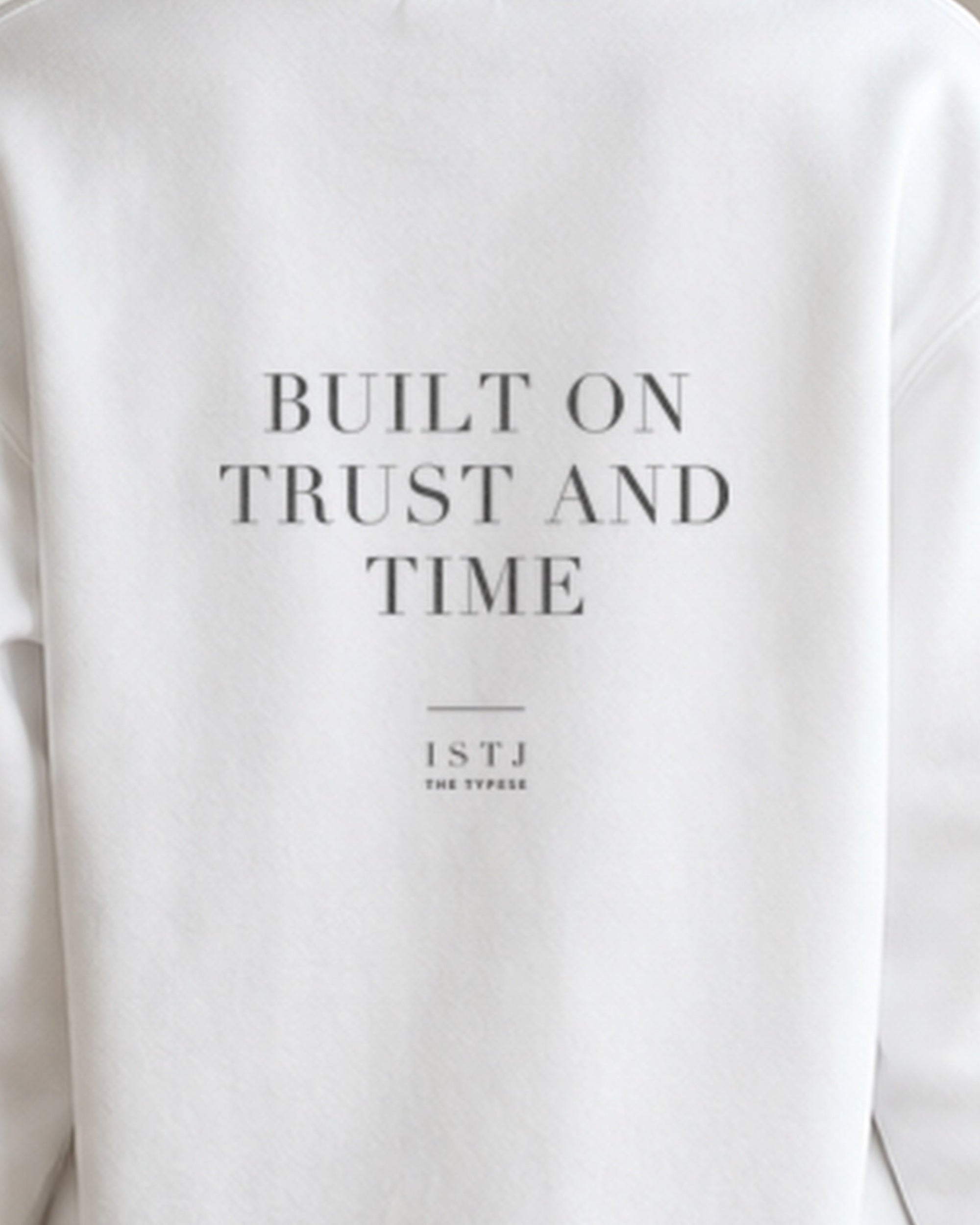 The Typese ISTJ Gildan crewneck sweatshirt in white, female back print close