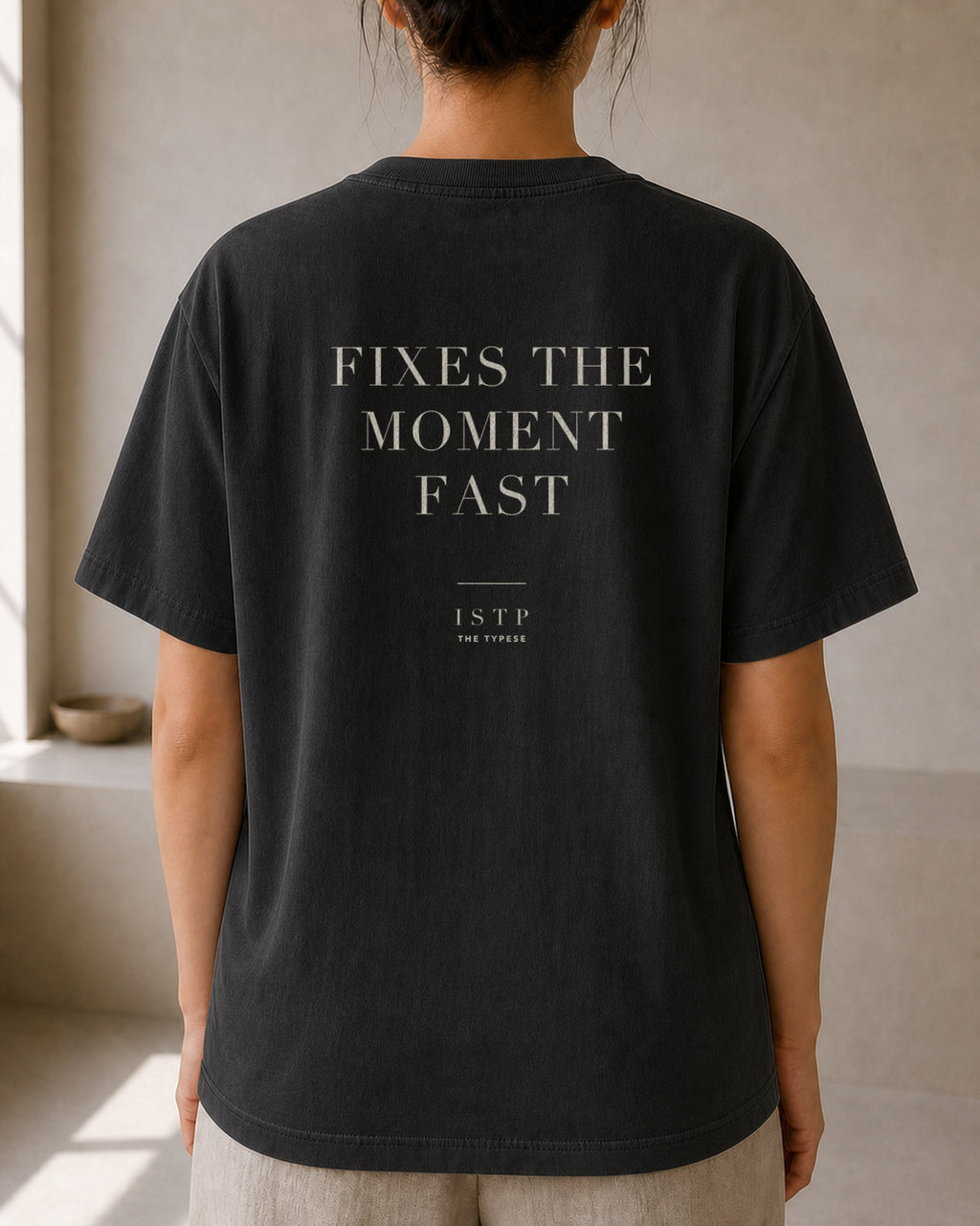 The Typese ISTP Comfort Colors Tee in black, female back