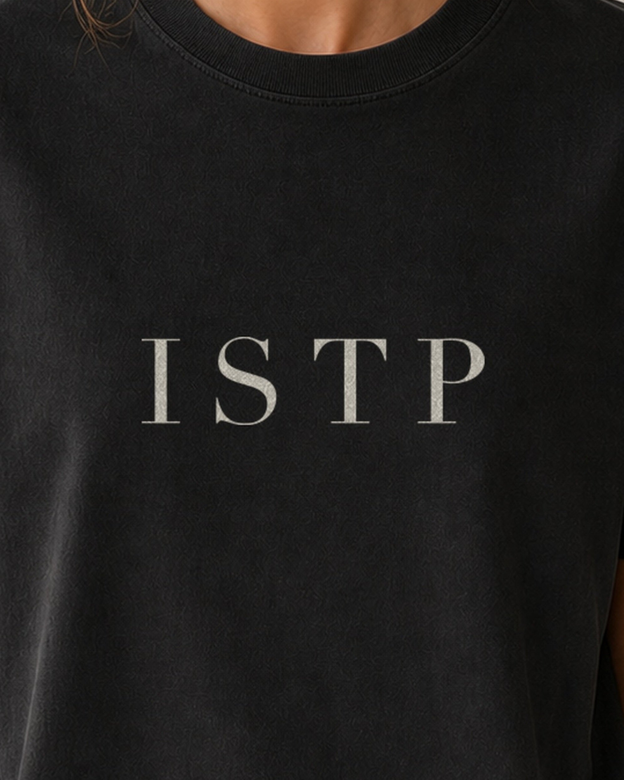 The Typese ISTP Comfort Colors Tee in black, female front detail