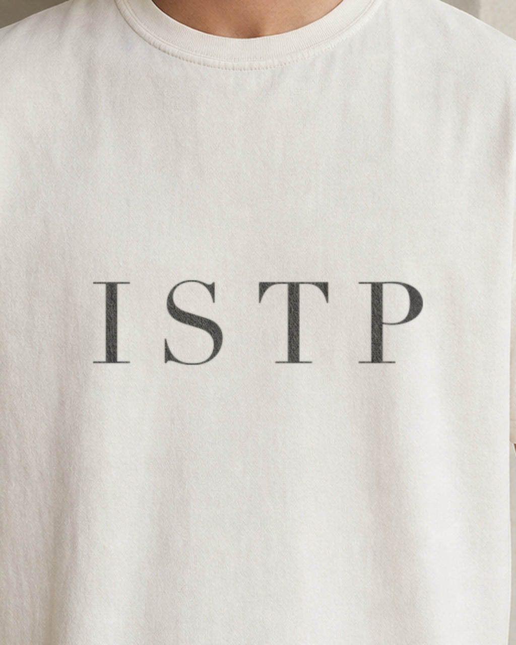 The Typese ISTP Comfort Colors Tee in cream white, male front detail