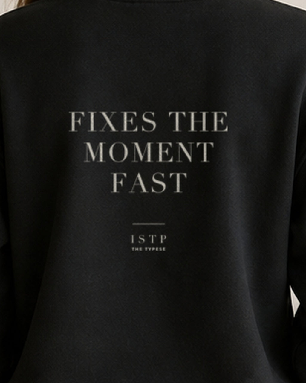The Typese ISTP Gildan crewneck sweatshirt in black, female back print close